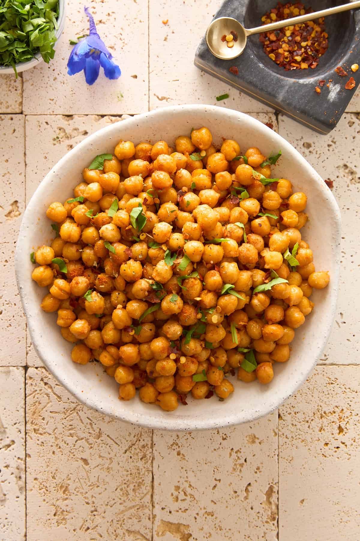 A bowl of seasoned air fryer chickpeas.