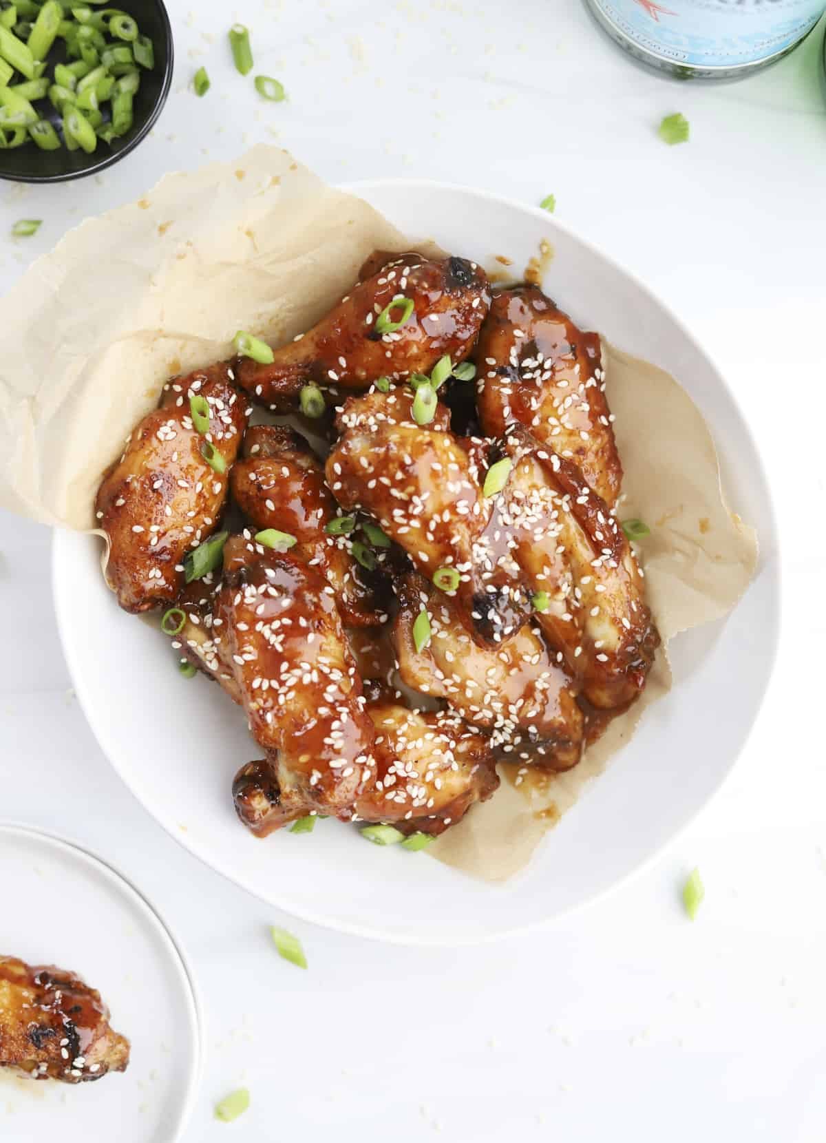 a bowl of air fryer honey garlic chicken wings