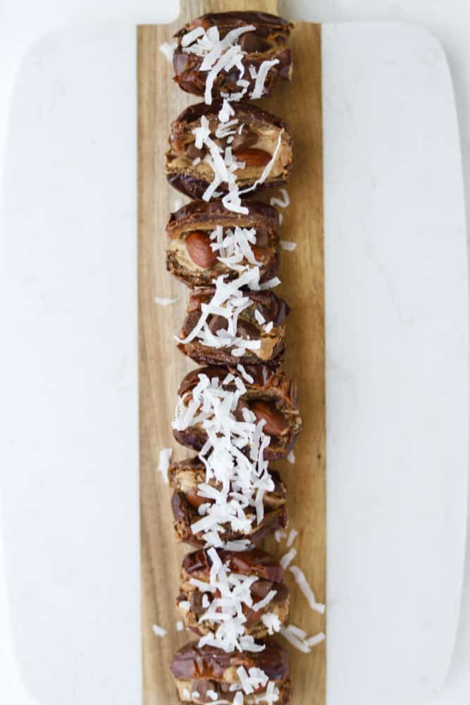 almond joy dates on a wooden board