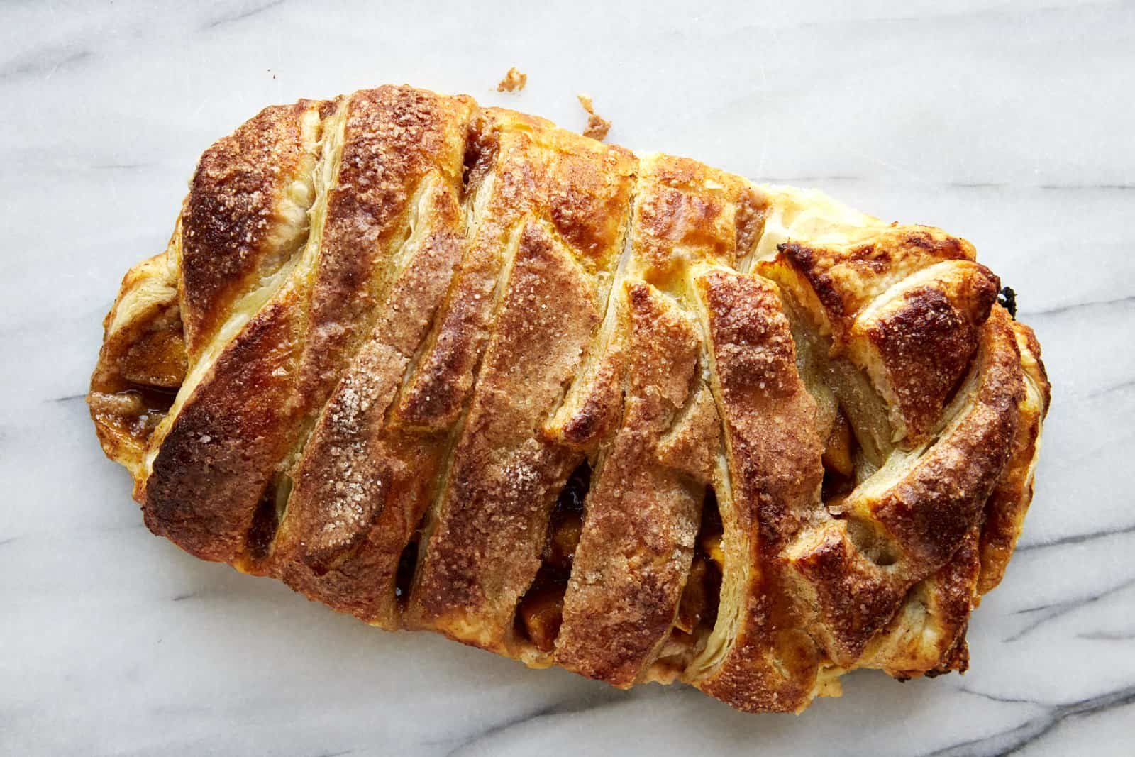 A baked apple puff pastry braid.
