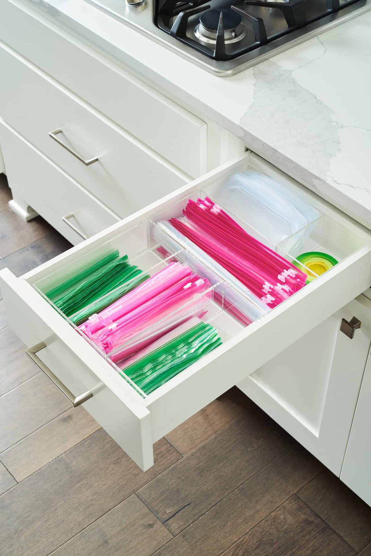 open drawer full of organized bags.