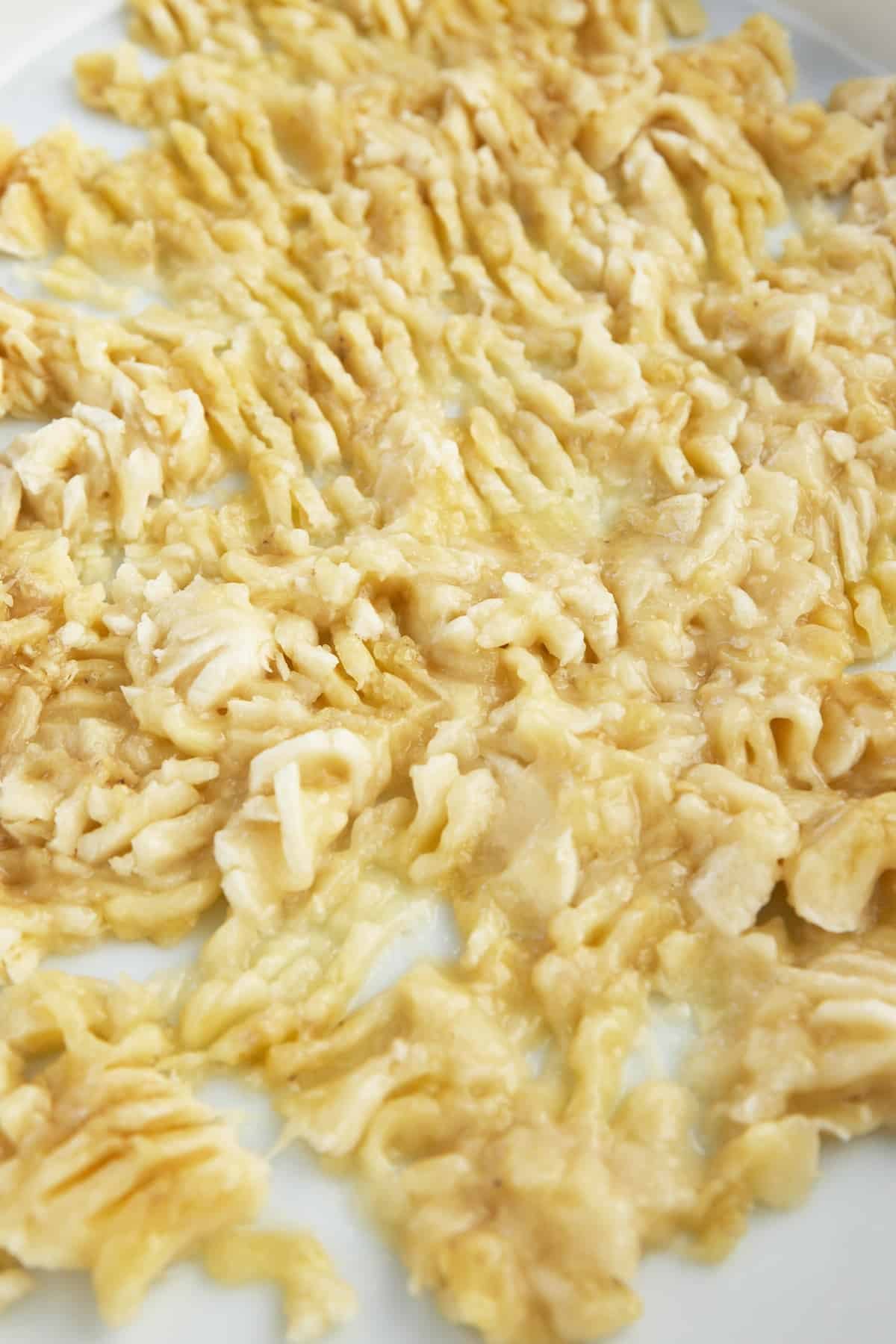 Mashed bananas in a baking dish.