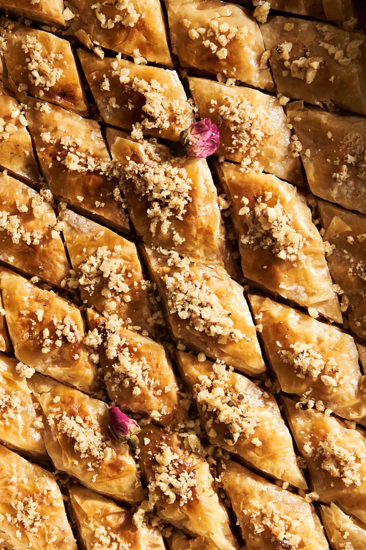 Baklava diamonds in a baking dish.