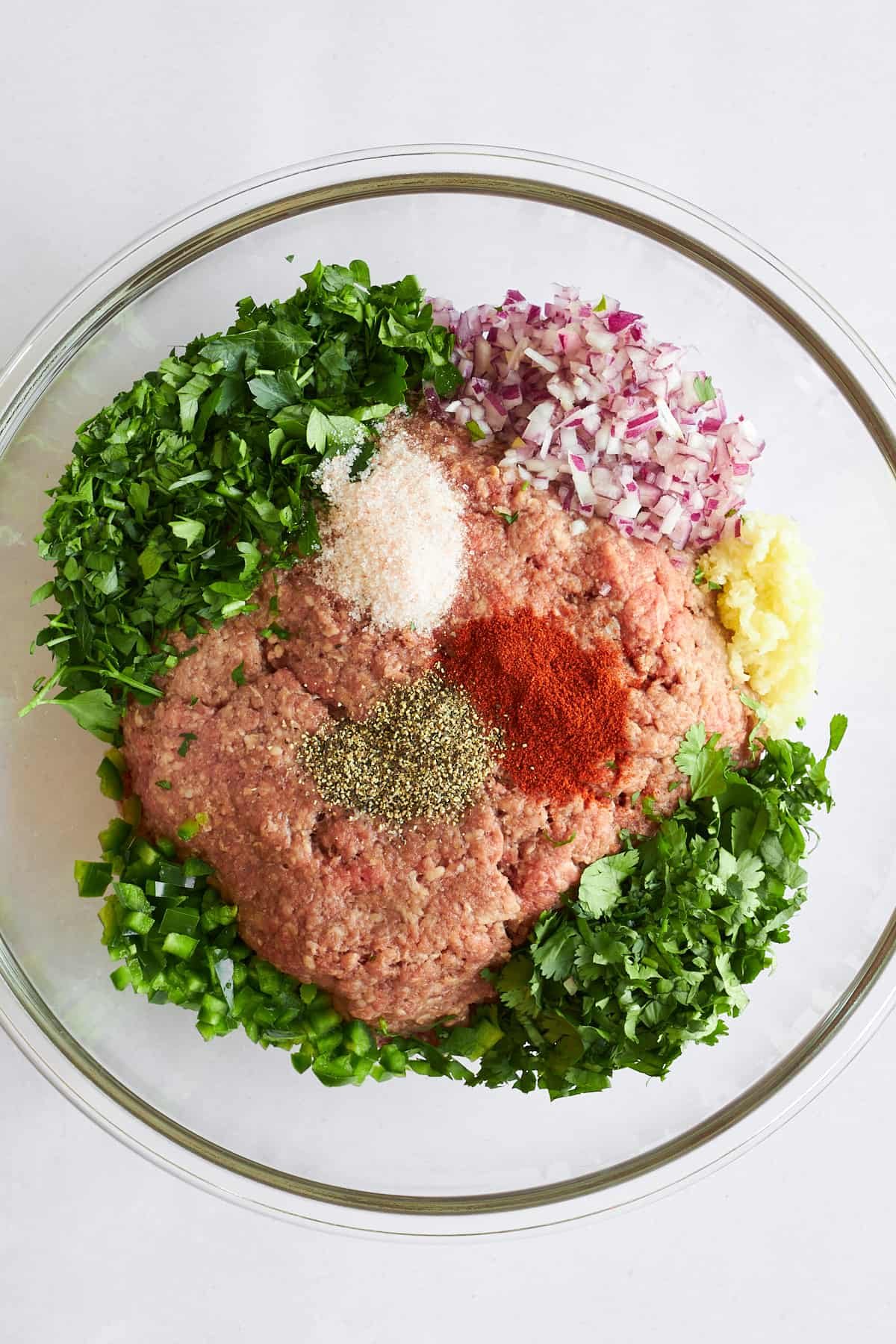 Ingredients for beef kofta in a bowl.