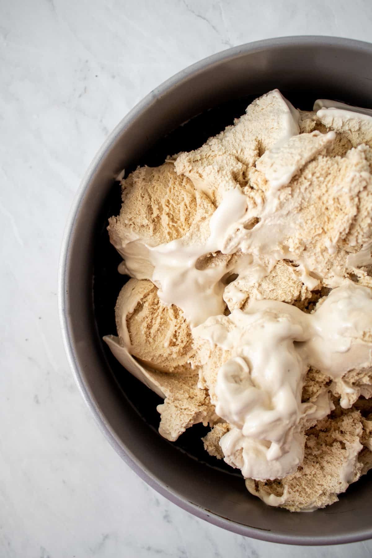 ice cream scoops on top of chocolate crust