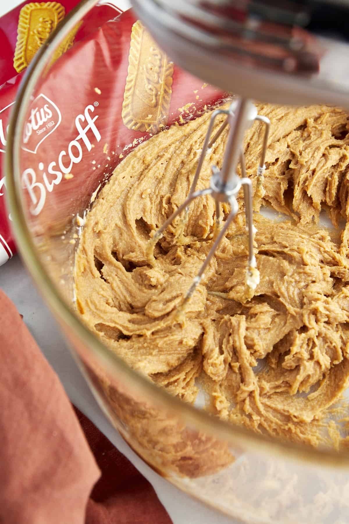 A mixer combining Biscoff cookie dough.
