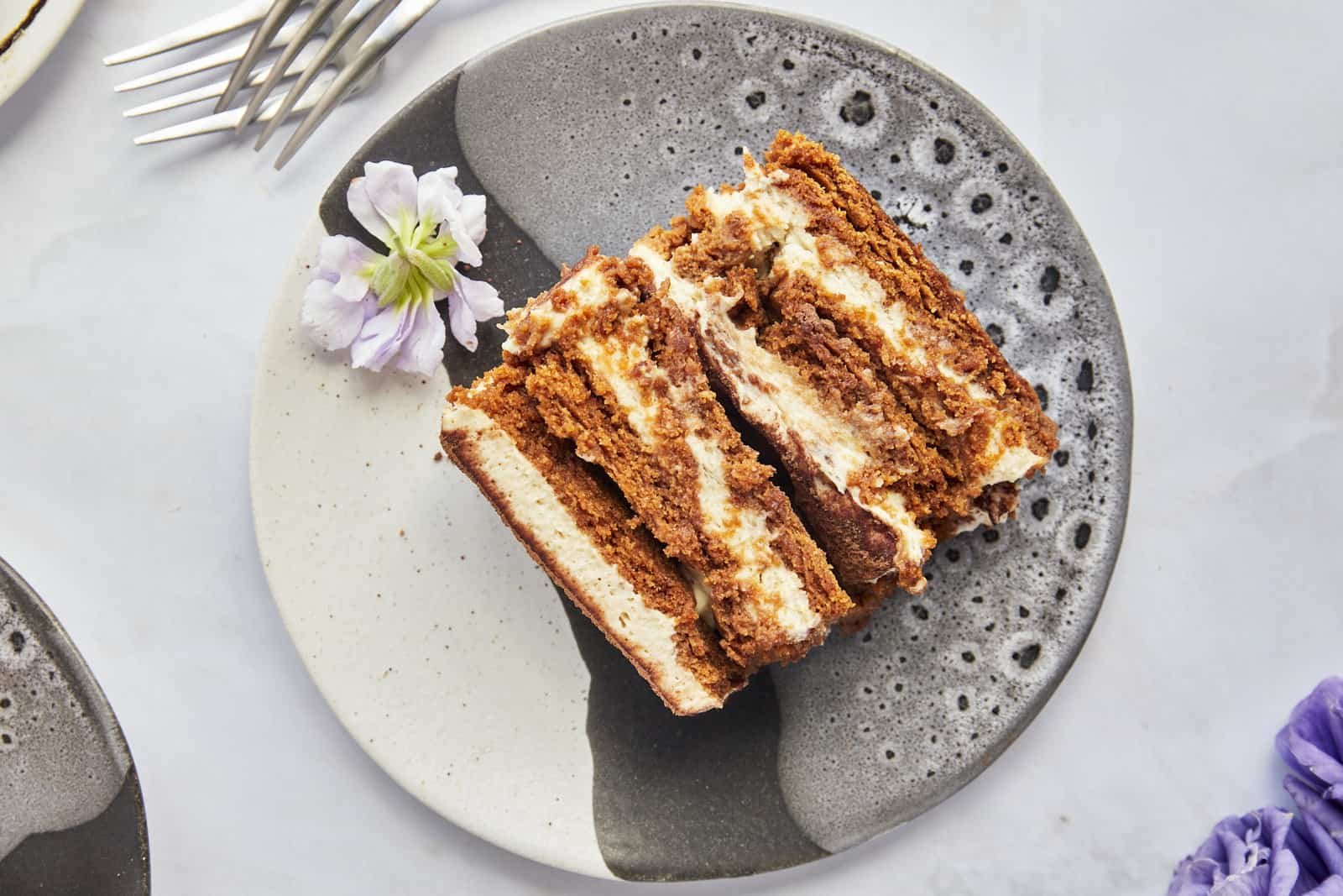 A slice of Biscoff tiramisu on a plate.