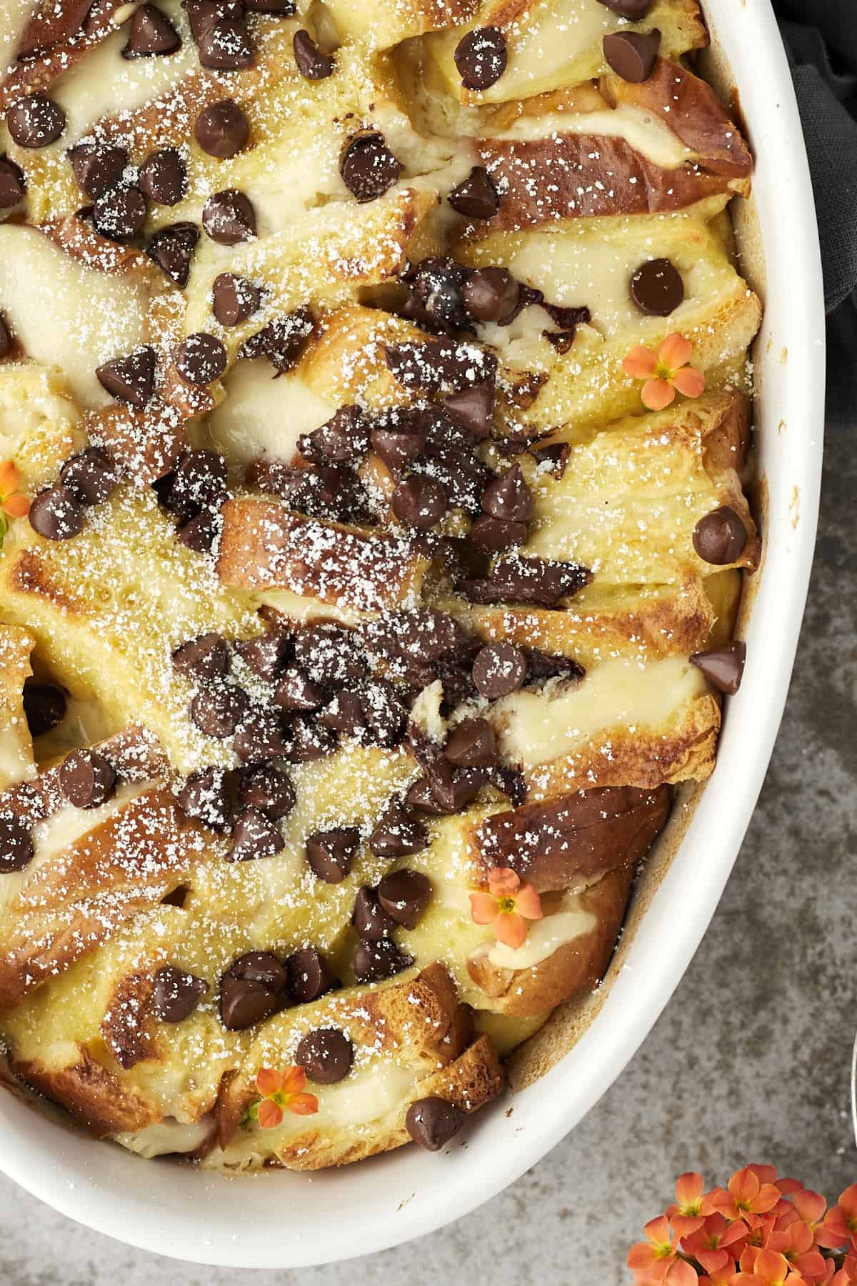 Cannoli baked french toast topped with chocolate chips.