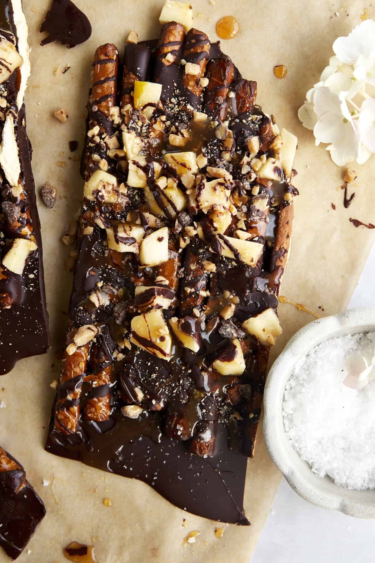 A piece of caramel apple pretzel bark.