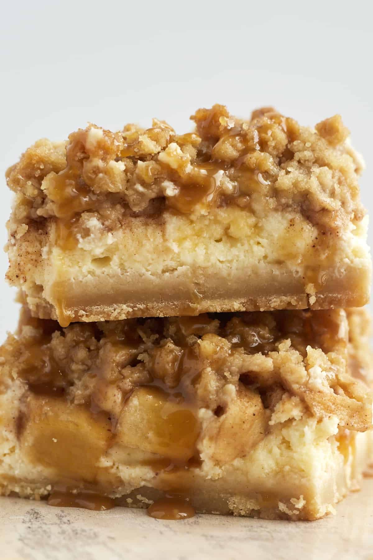 two cheesecake bars stacked on top of each other