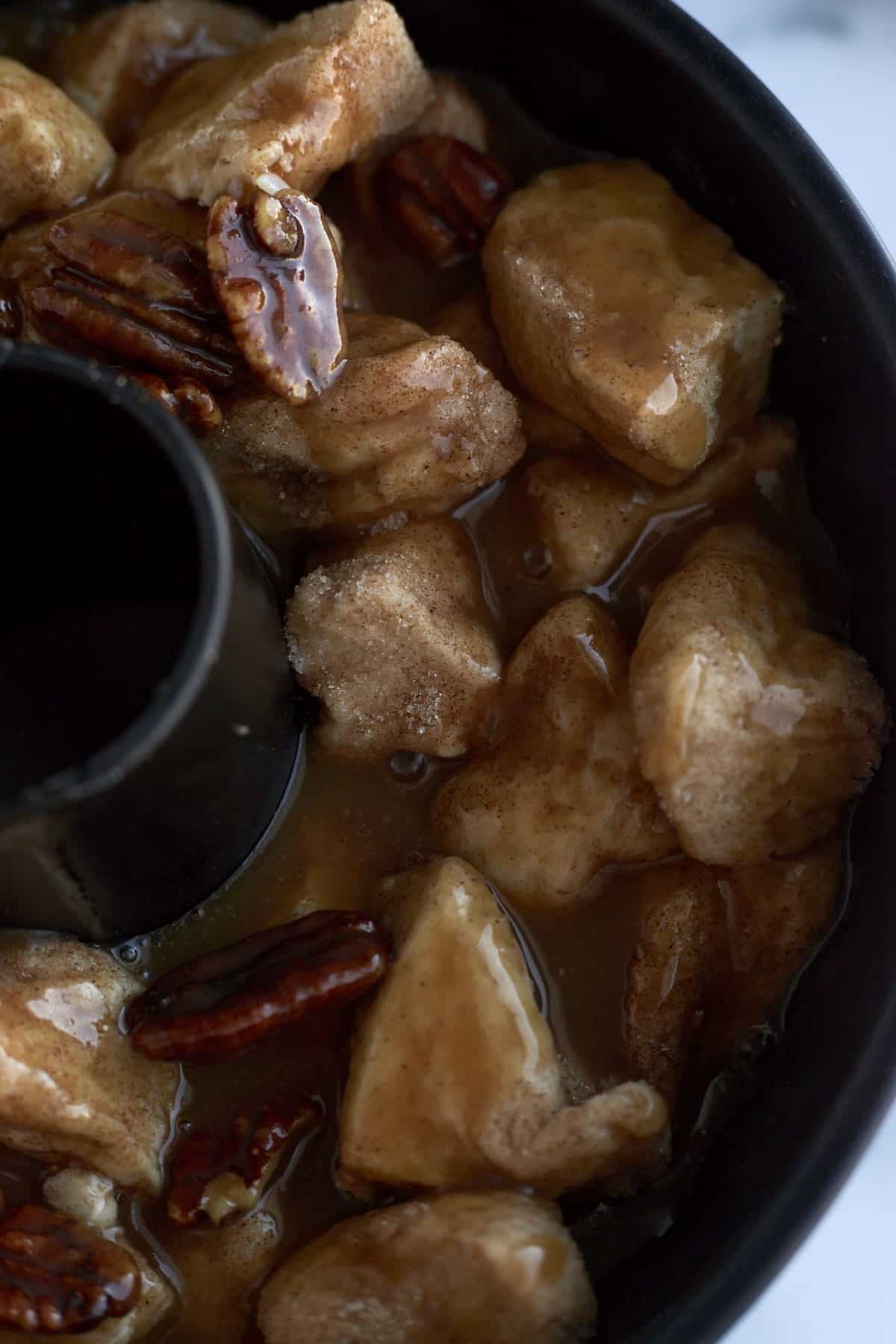 pecan caramel monkey bread in a bundt pan.