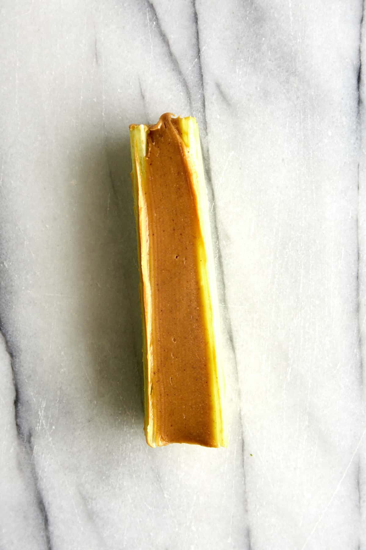 A celery stick full of peanut butter.
