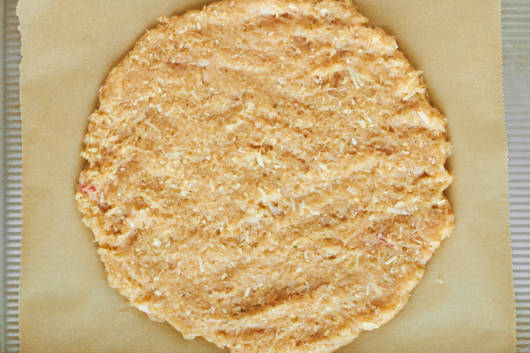 Raw chicken pizza crust.