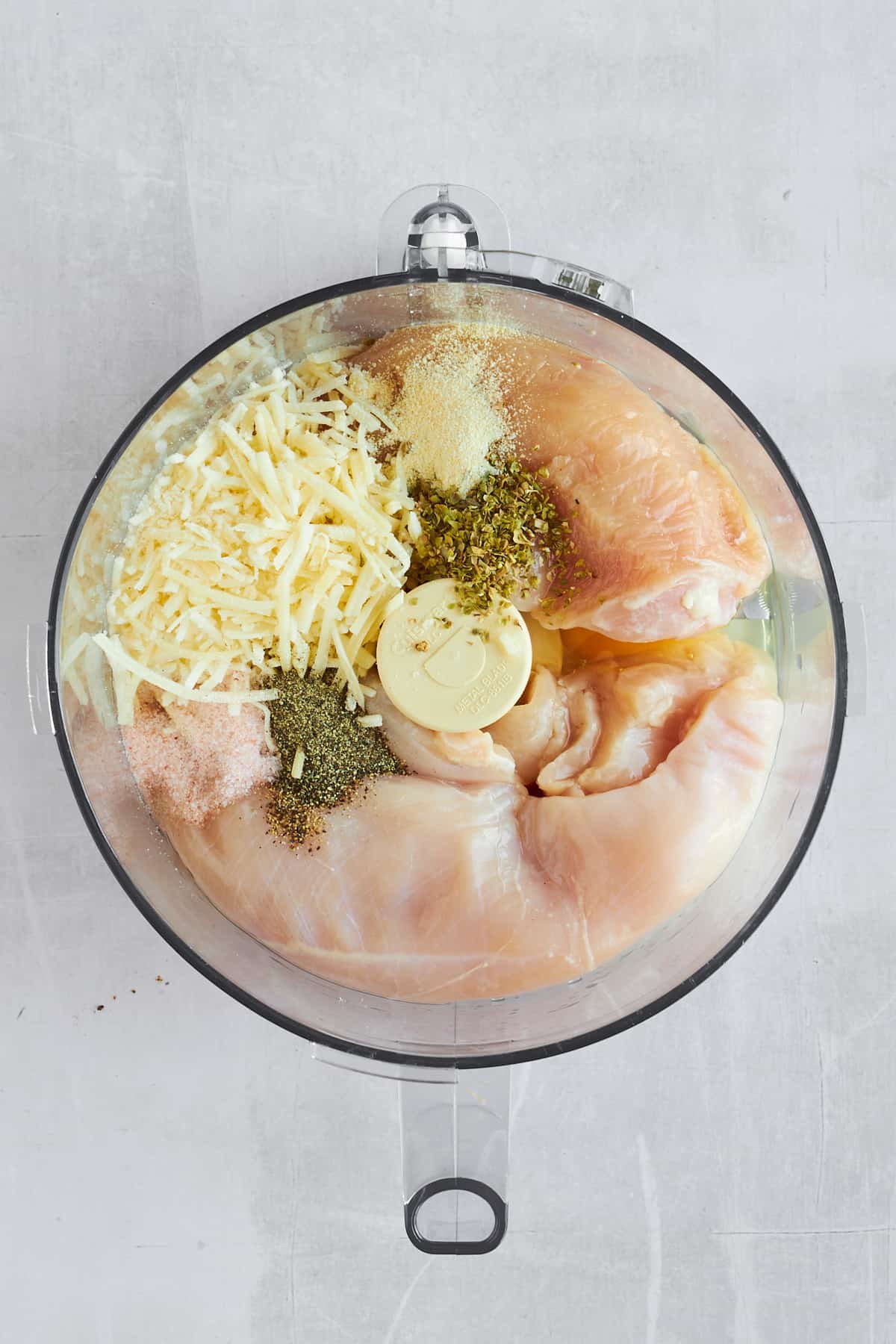 Chicken crust ingredients in a food processor.