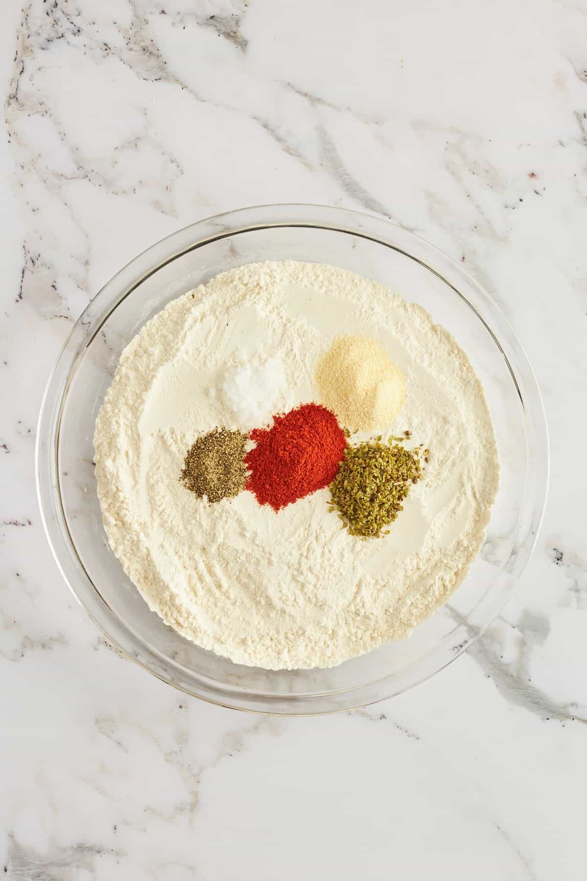 Flour and spices in a bowl.