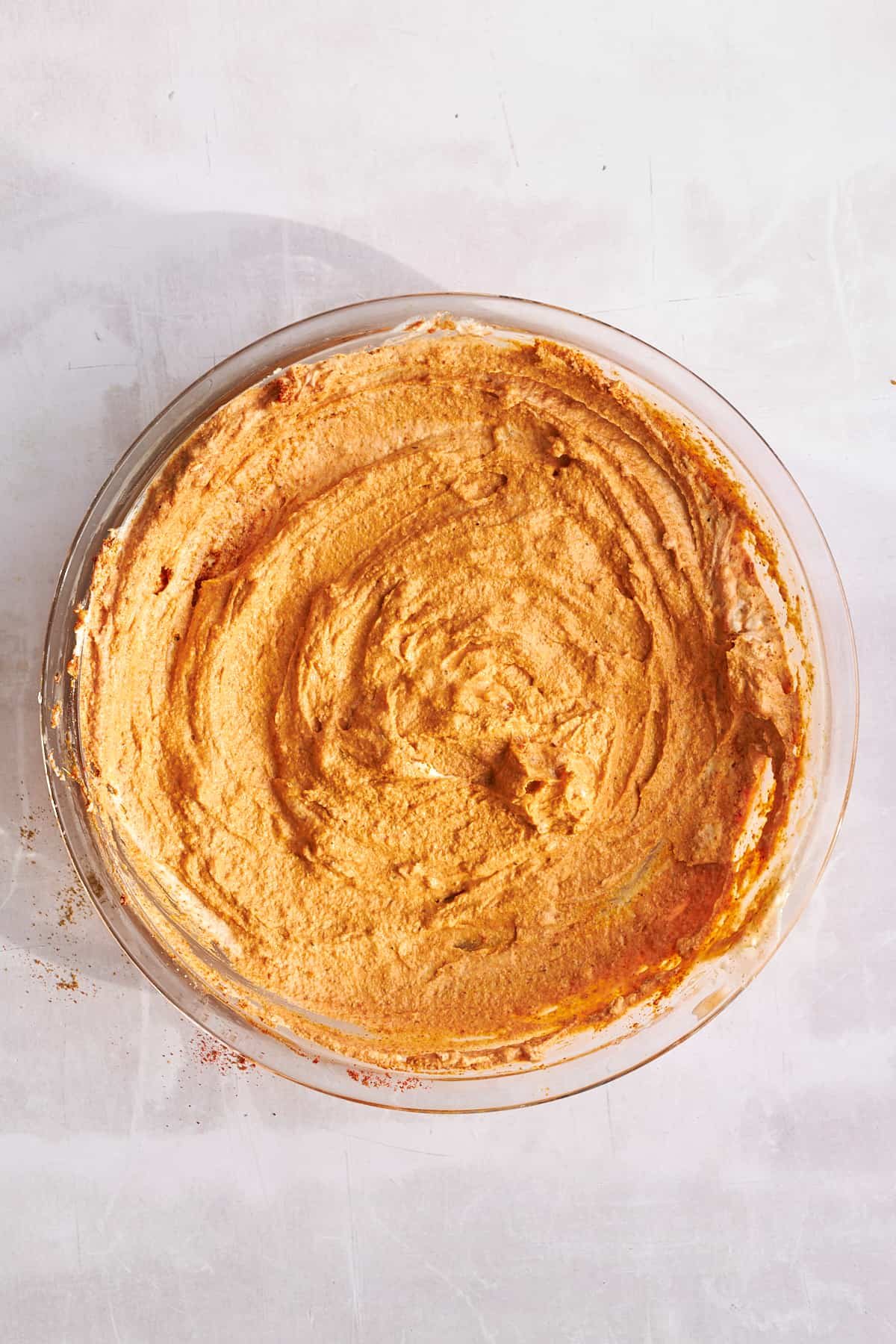 Chicken shawarma marinade in a bowl.