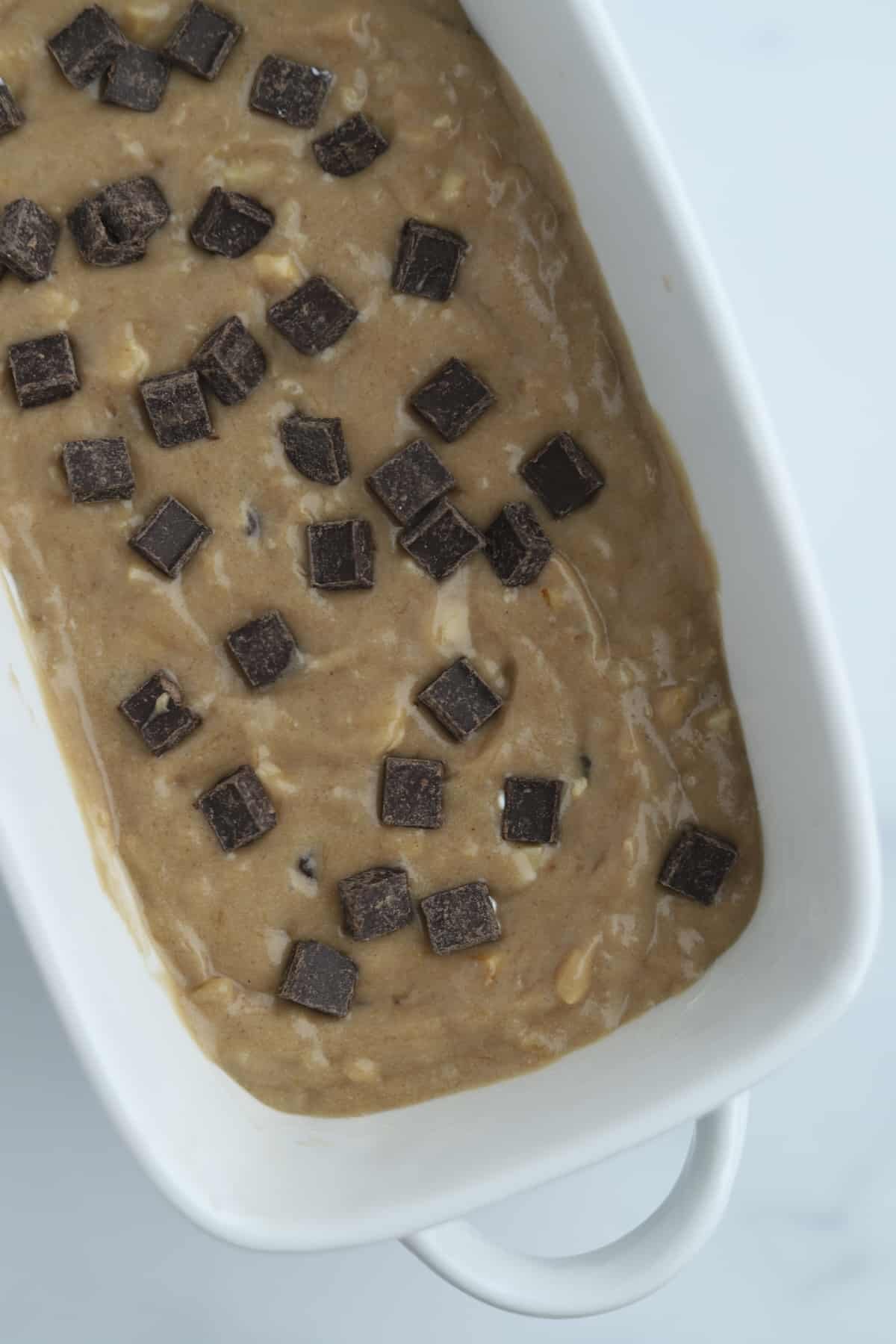 unbaked chocolate hazelnut banana bread with chocolate chunks