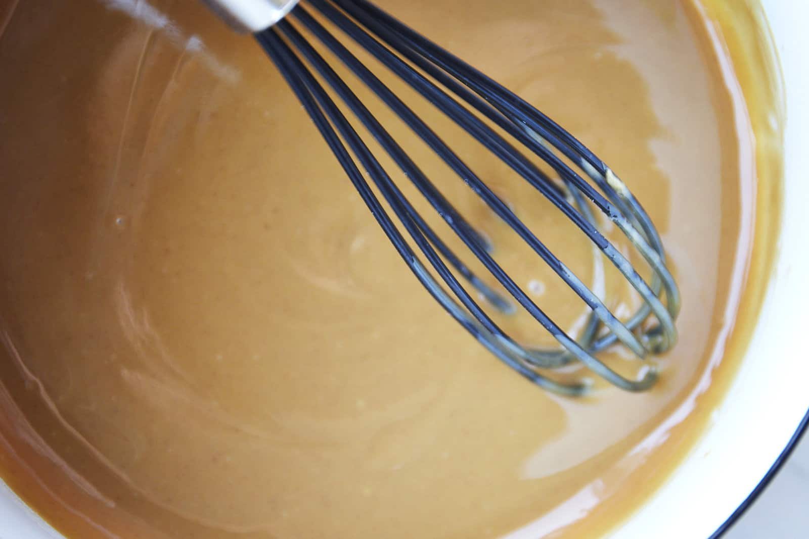 Peanut butter filling being whisked.