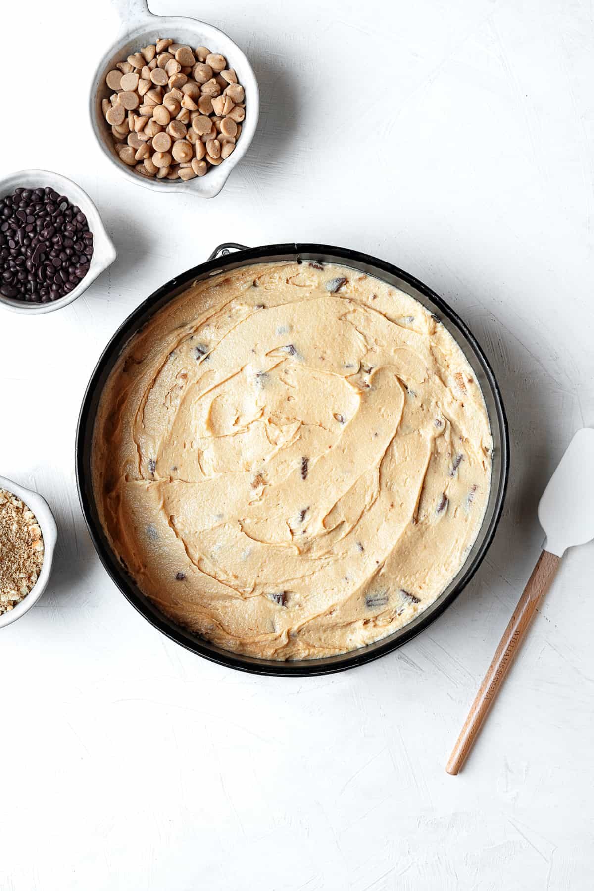 creamy filling in a pie pan for no bake chocolate peanut butter pie.