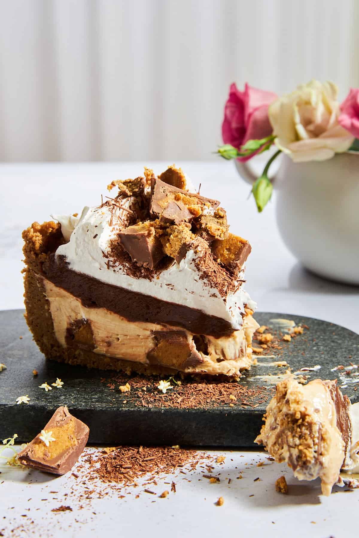 A slice of no-bake chocolate peanut butter pie.