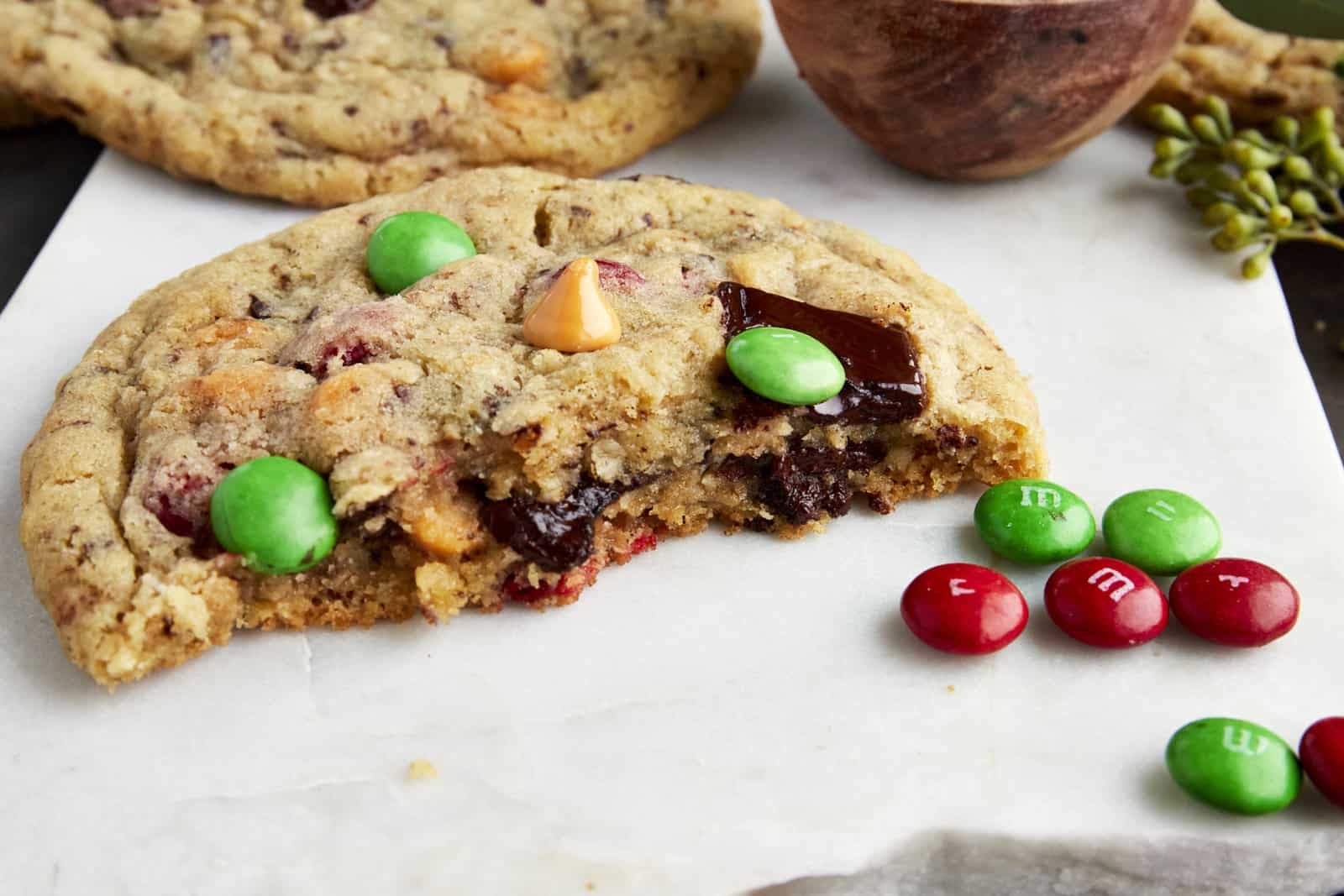 Half of a Christmas monster cookie.