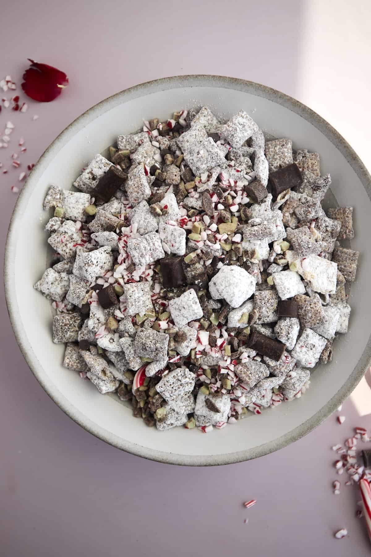 a bowl of chocolate peppermint Christmas puppy chow.