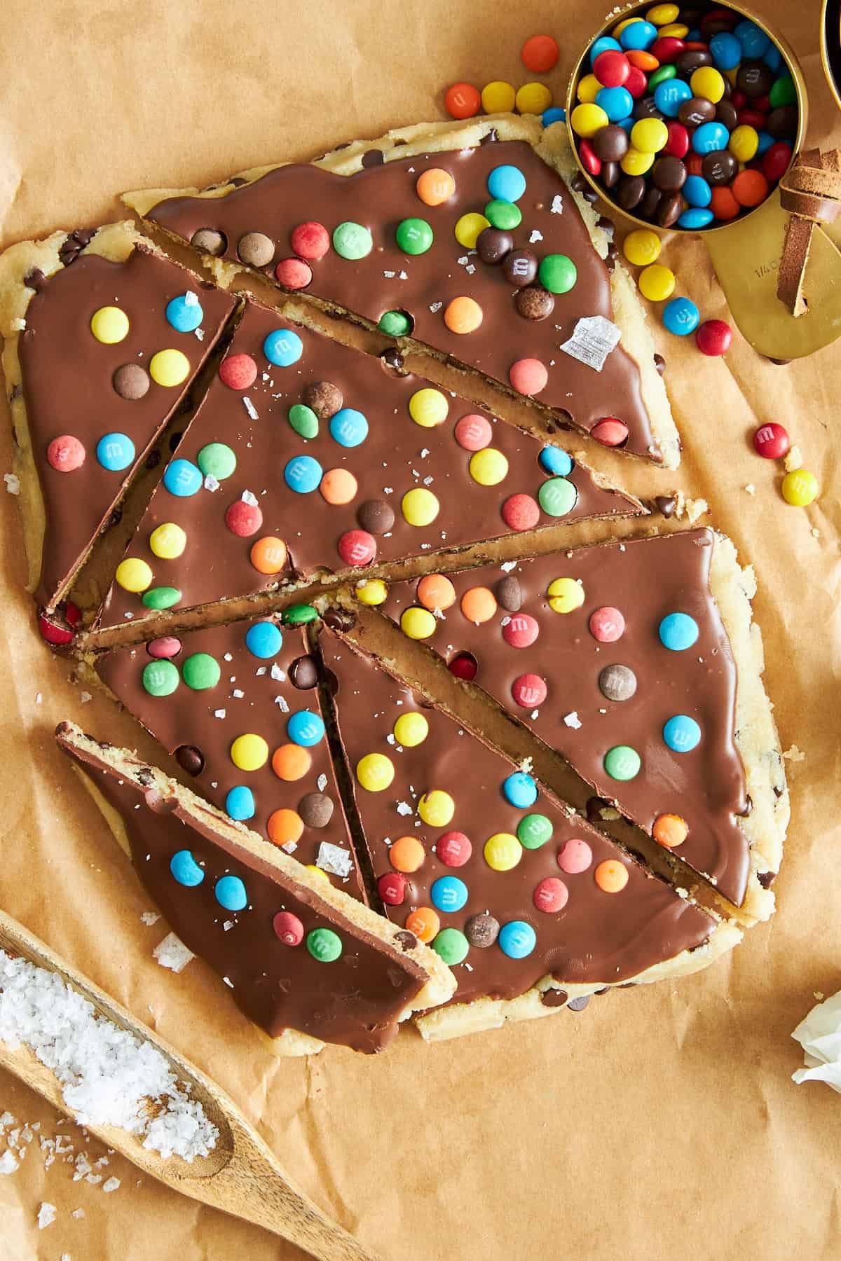 Cookie dough bark cut into large triangles.