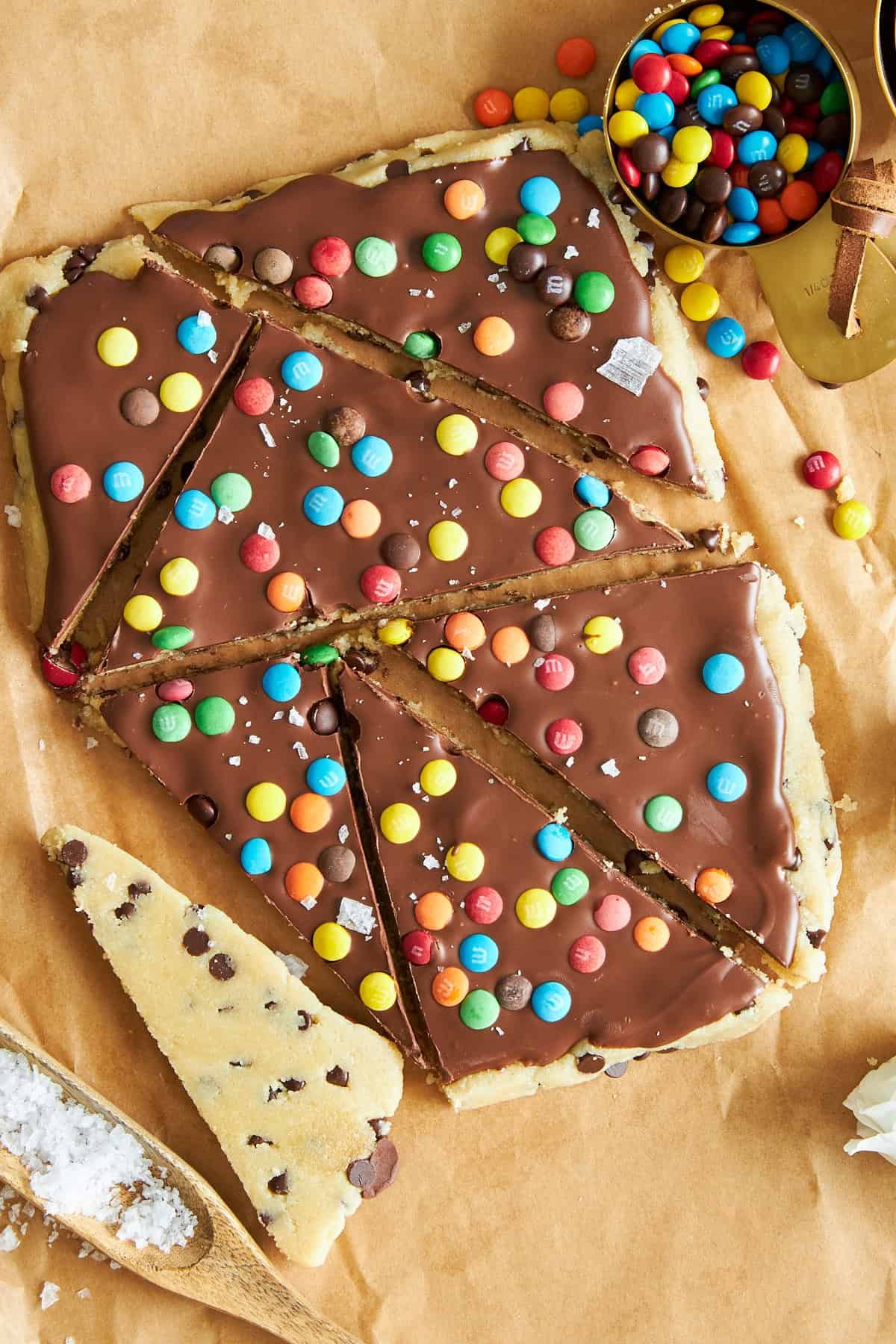 Cookie dough bark topped with chocolate and mini m&ms.