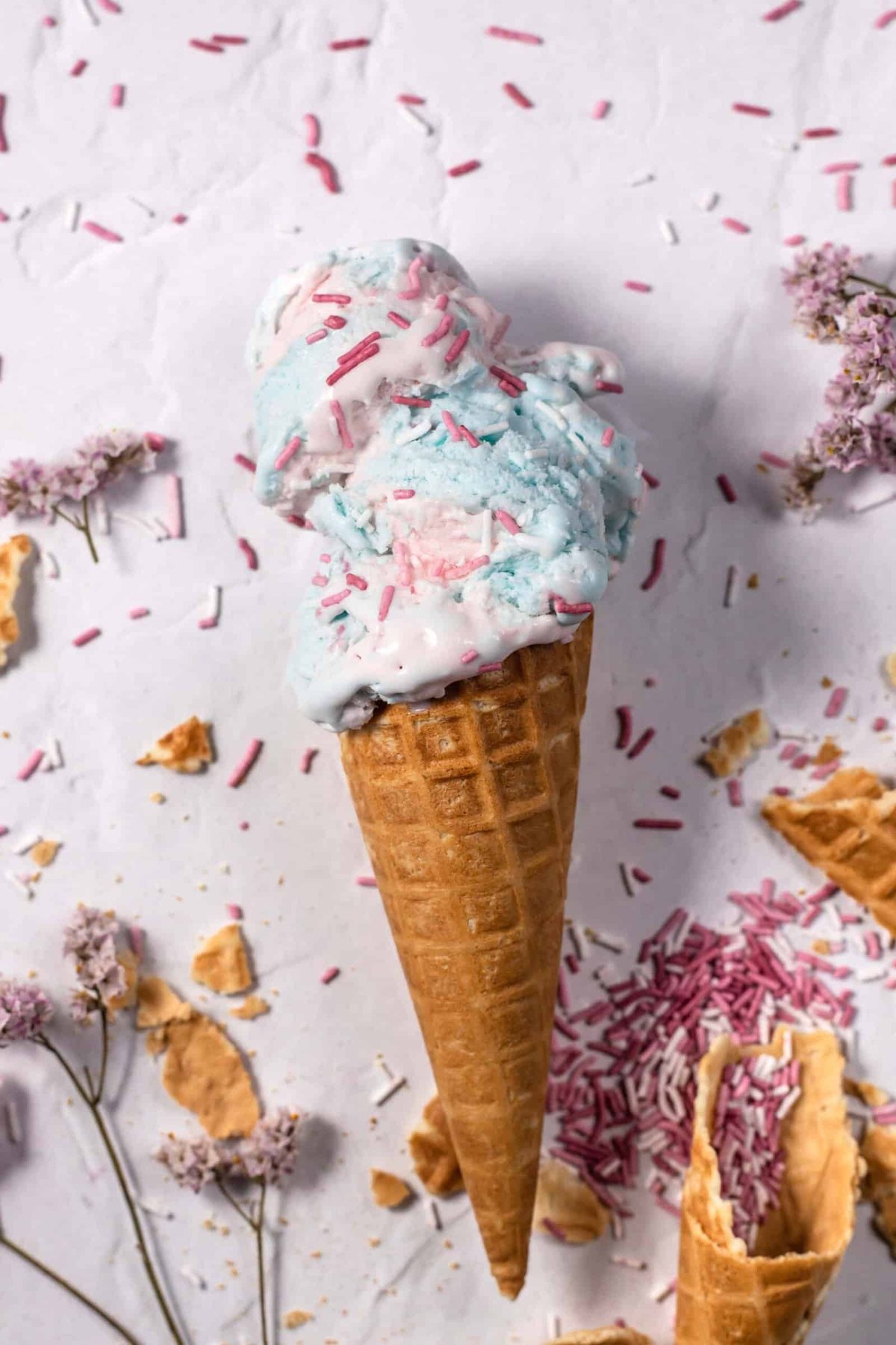 an ice cream cone stuffed with from-scratch cotton candy ice cream