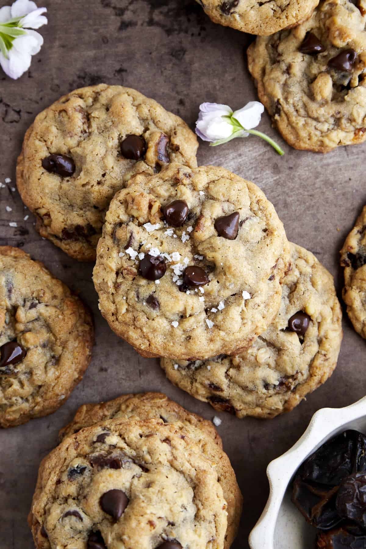 Overhead image of baked date cookies with chocolate chips and walnuts.