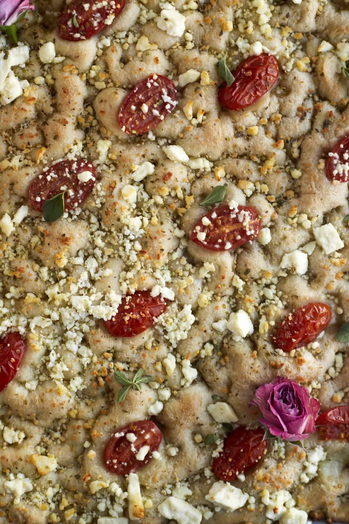 Baked easy focaccia with tomatoes and feta