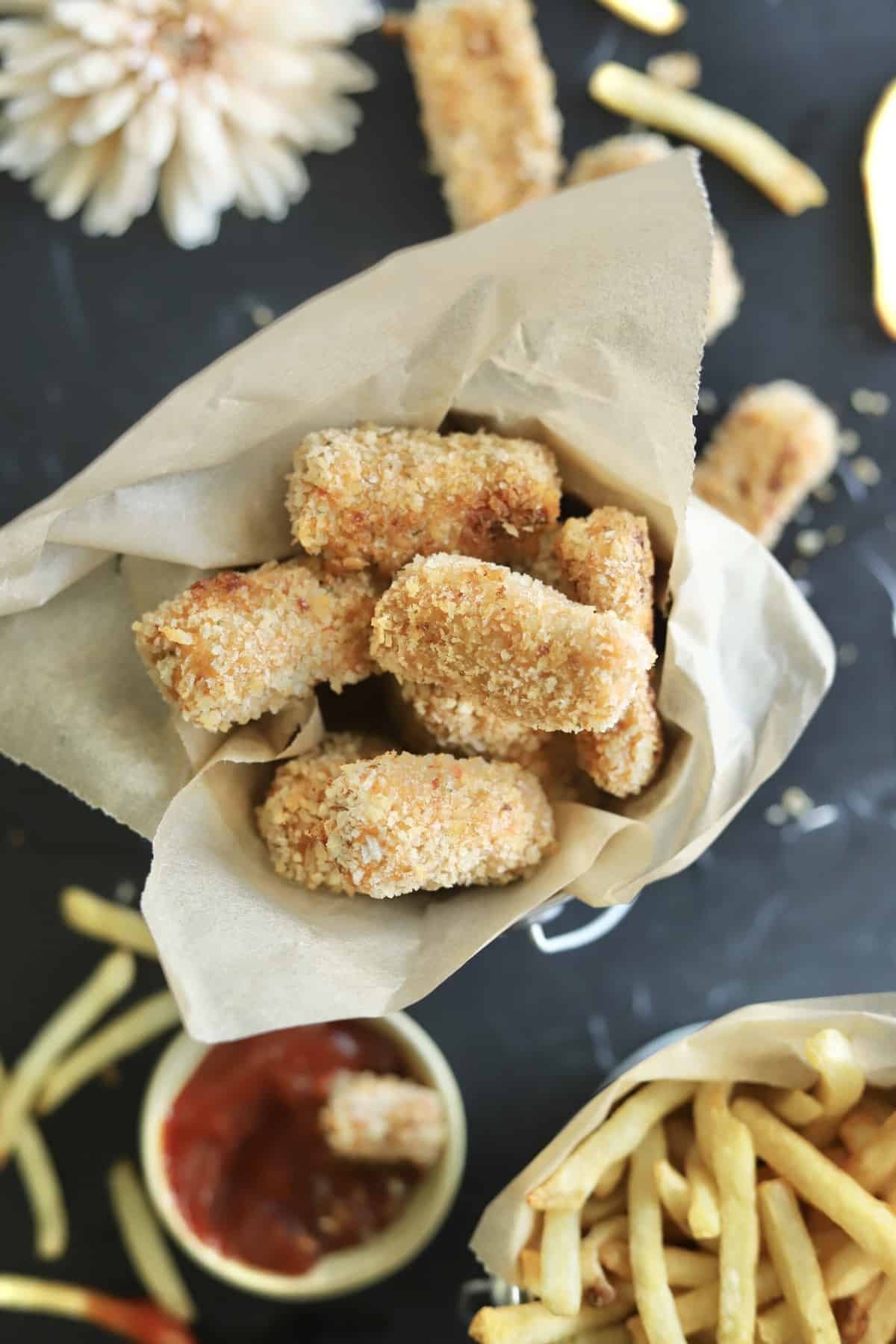 a basket full of crispy baked chicken nuggets