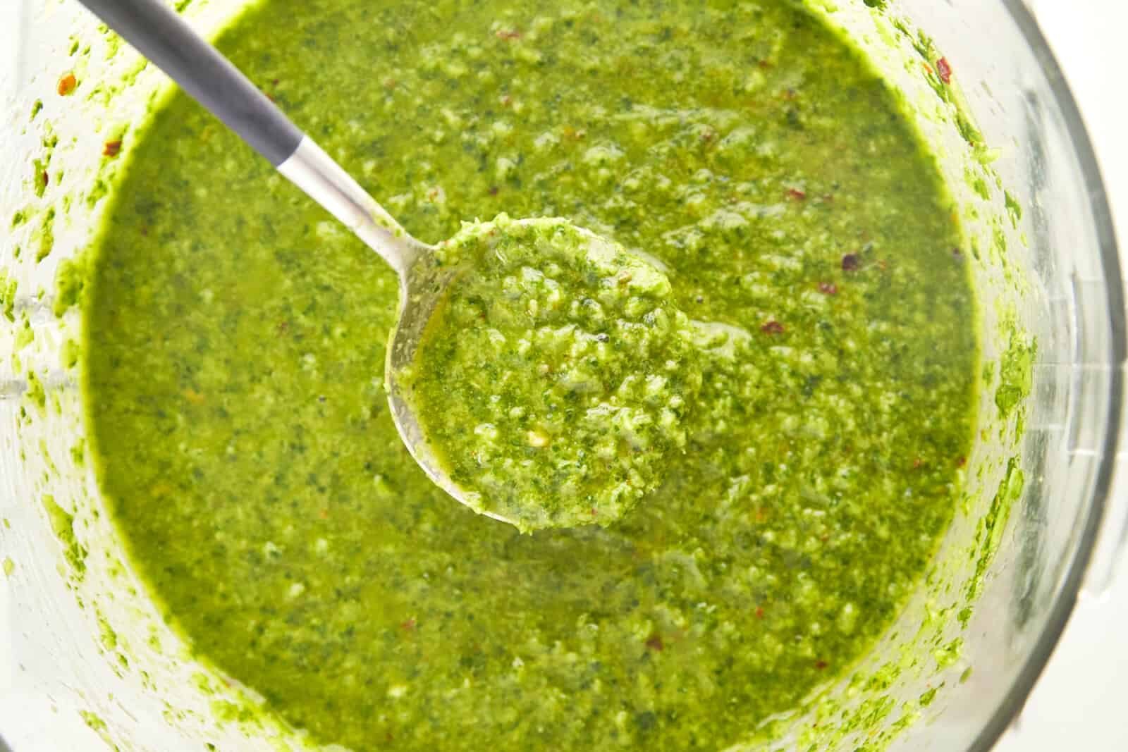 Blended zhoug sauce in a food processor.