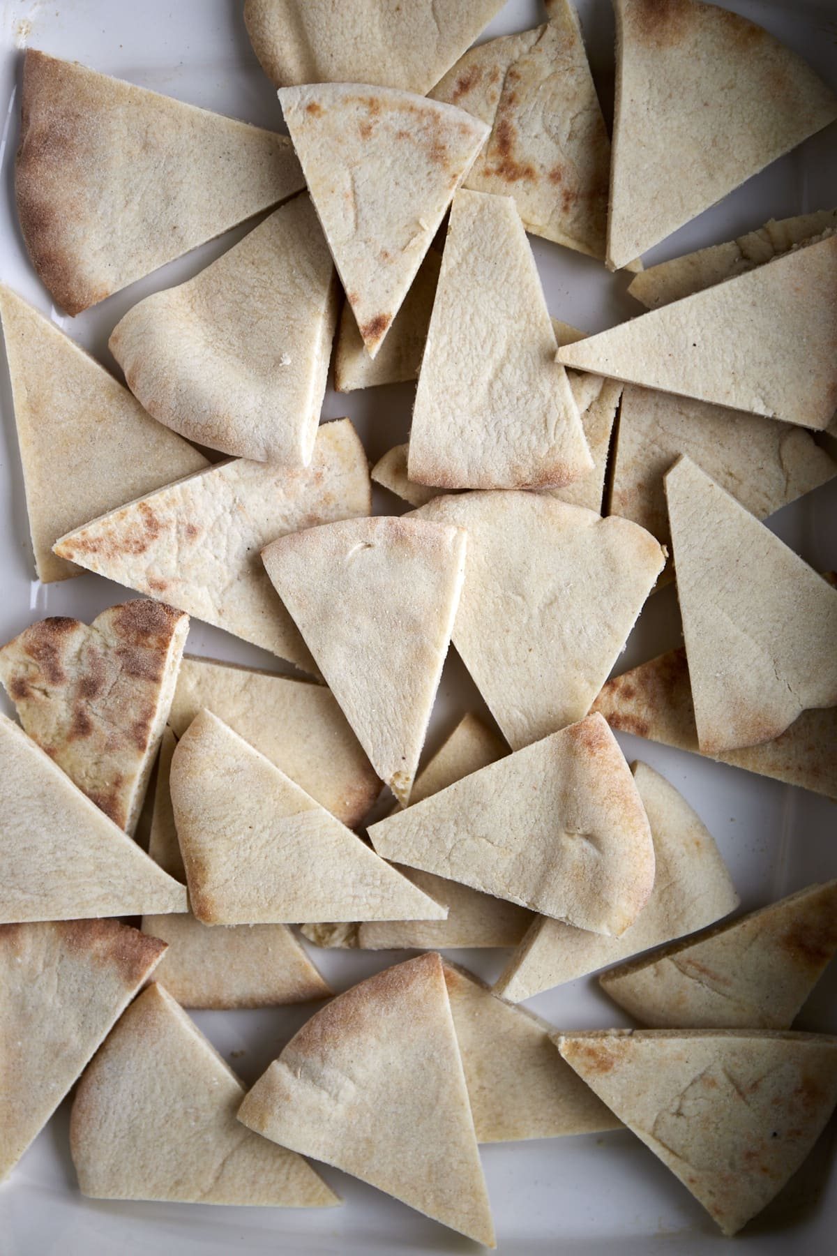 Pita bread cut into triangles.