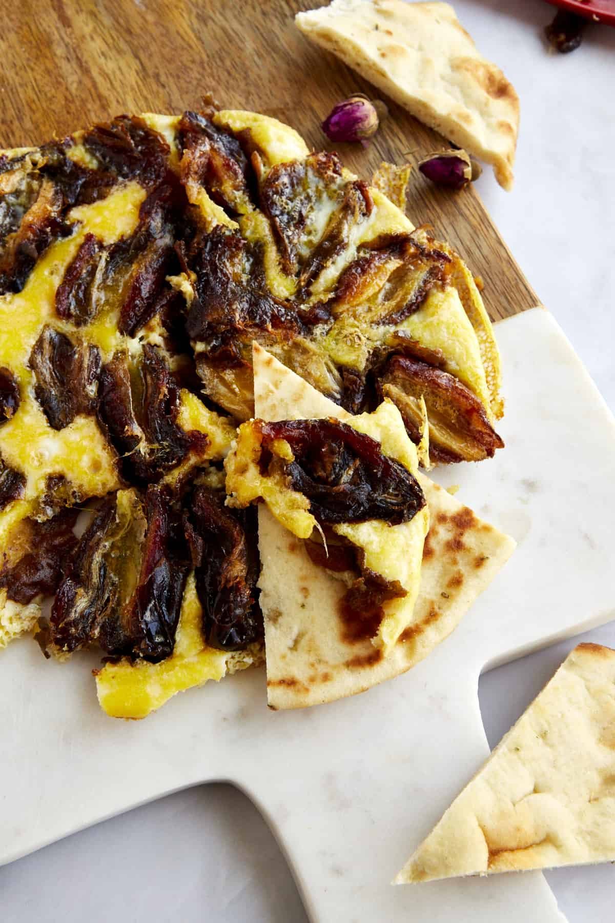 Eggs and dates with pita bread.