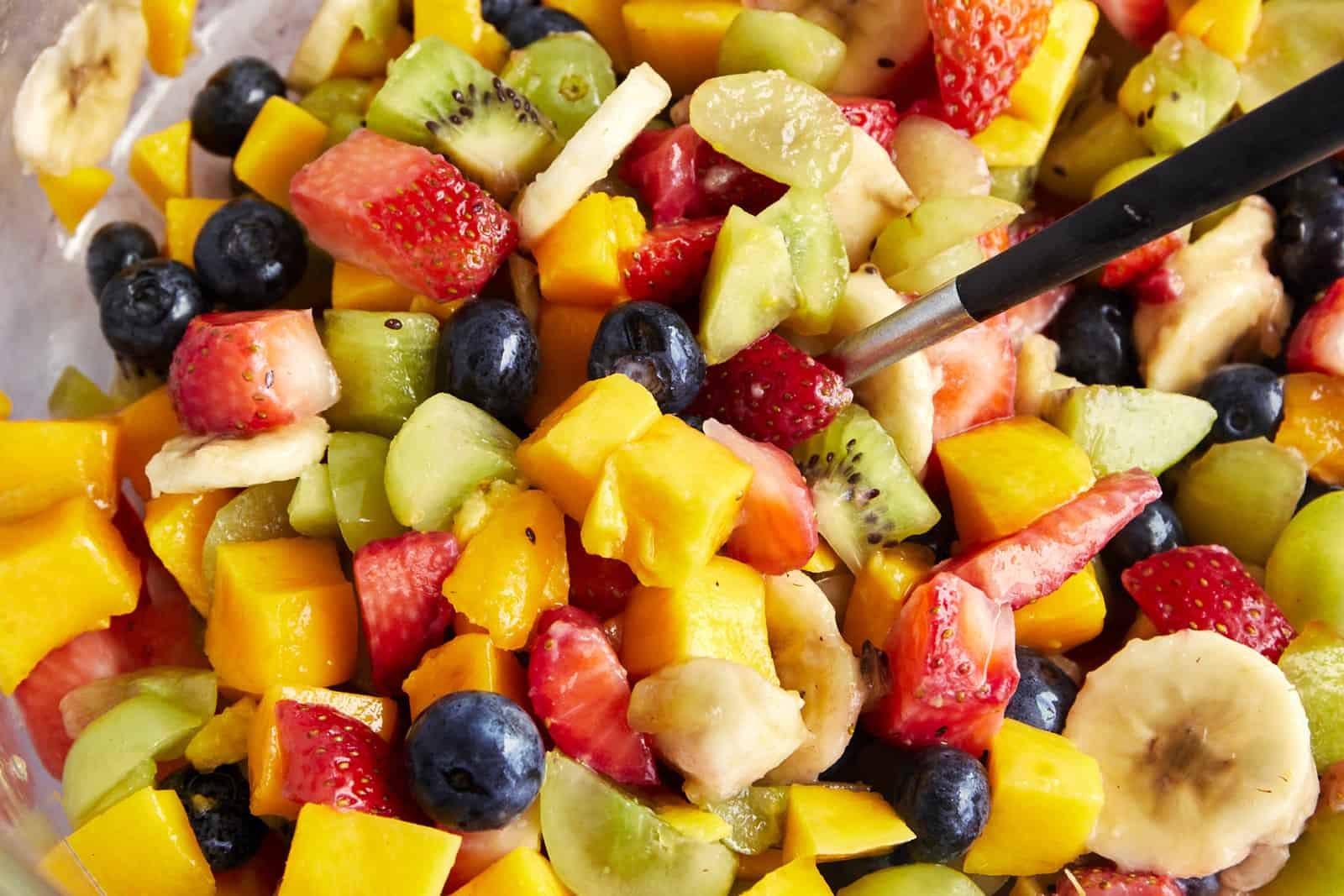 Close up image of an assortment of chopped fruit.