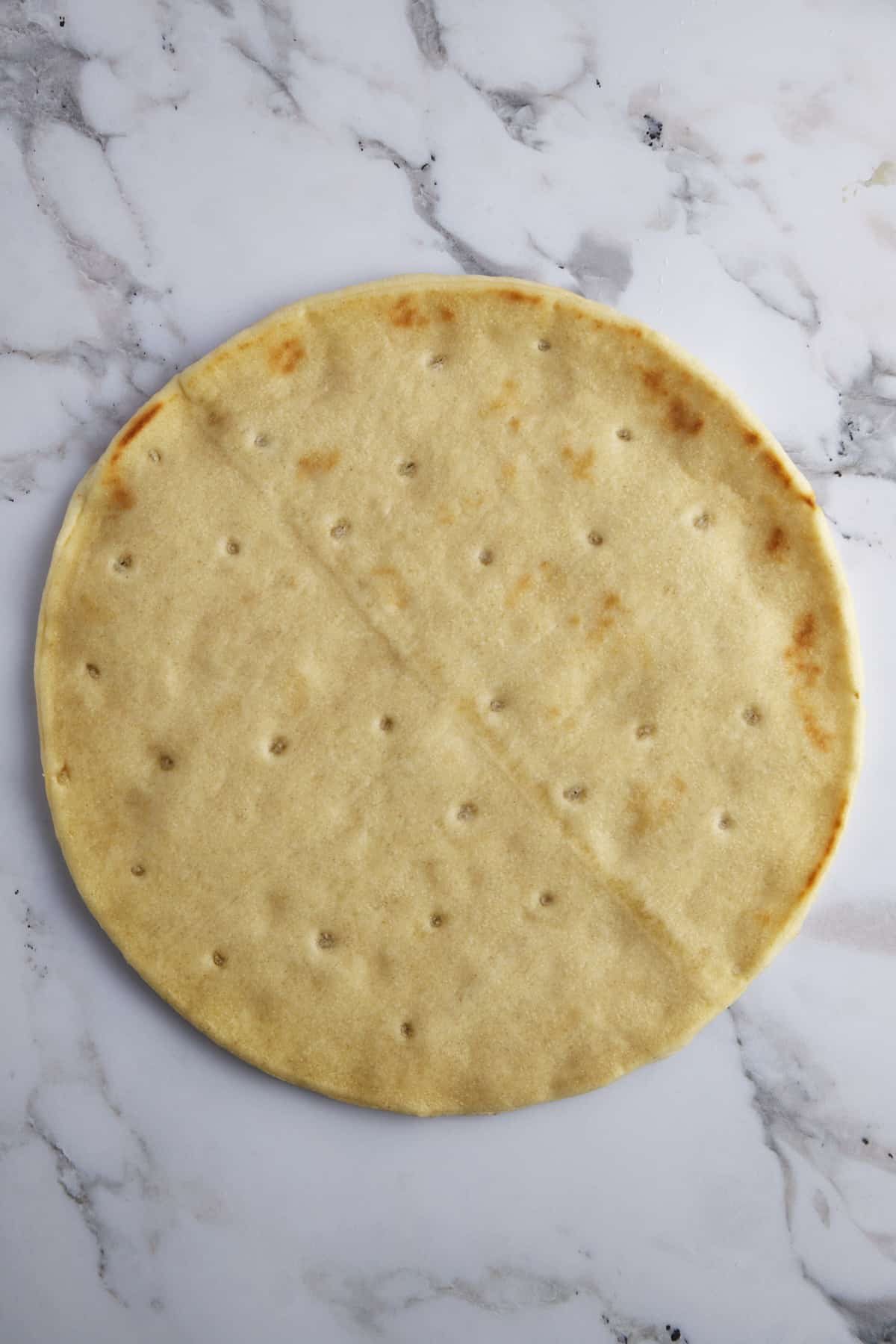 A round pizza crust.