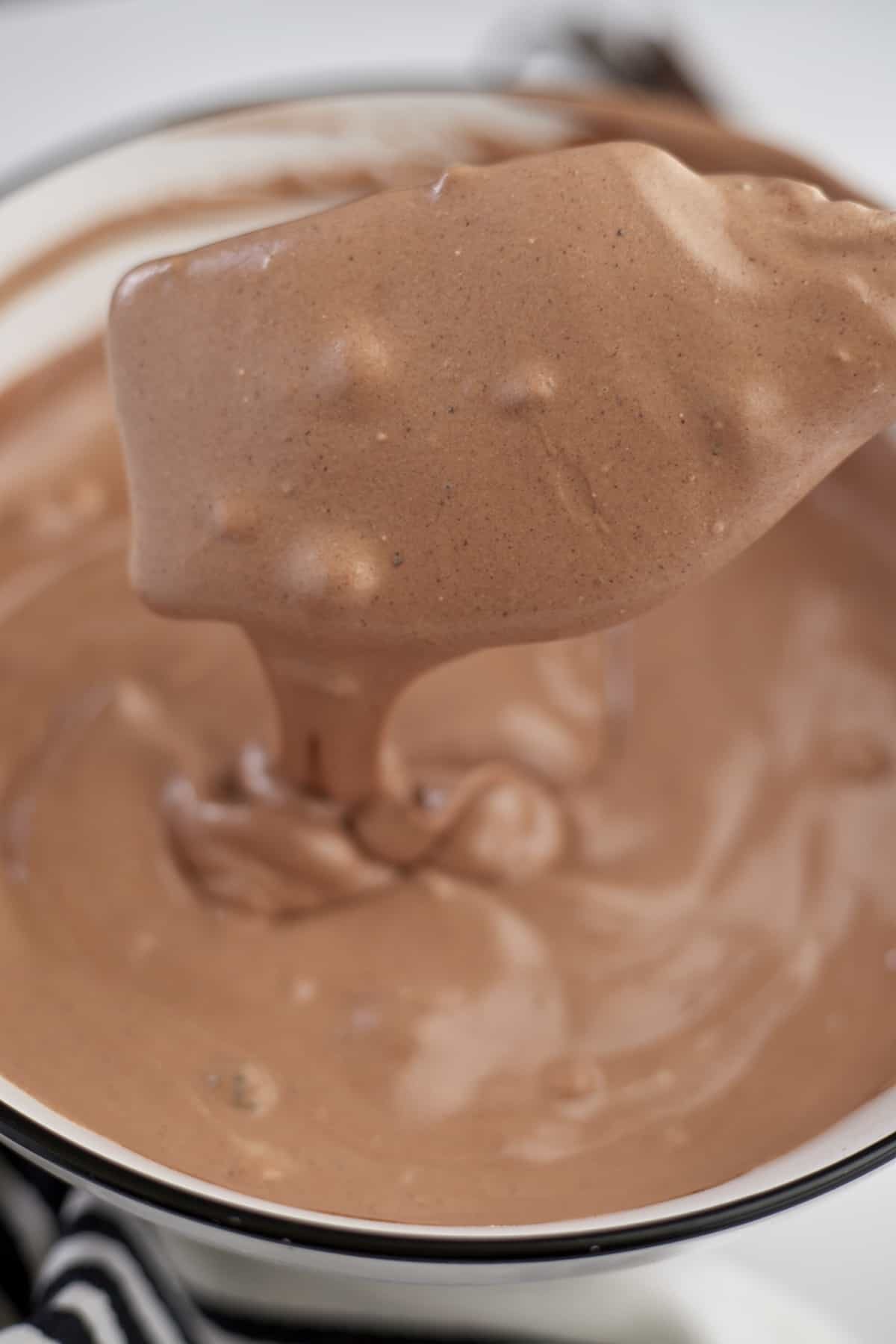whipped chocolate mousse with a rubber spatula