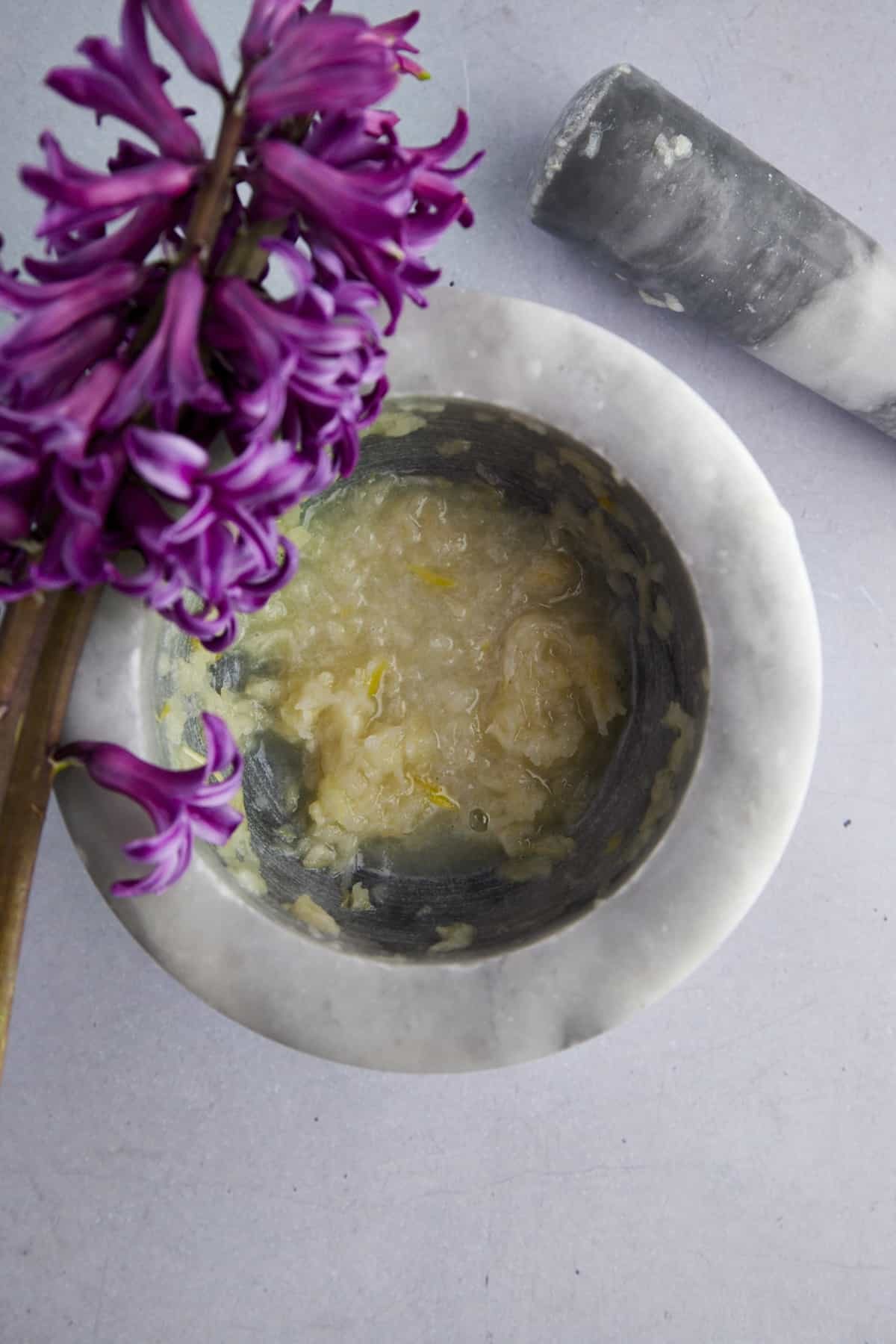 garlic past in a mortar and pestle