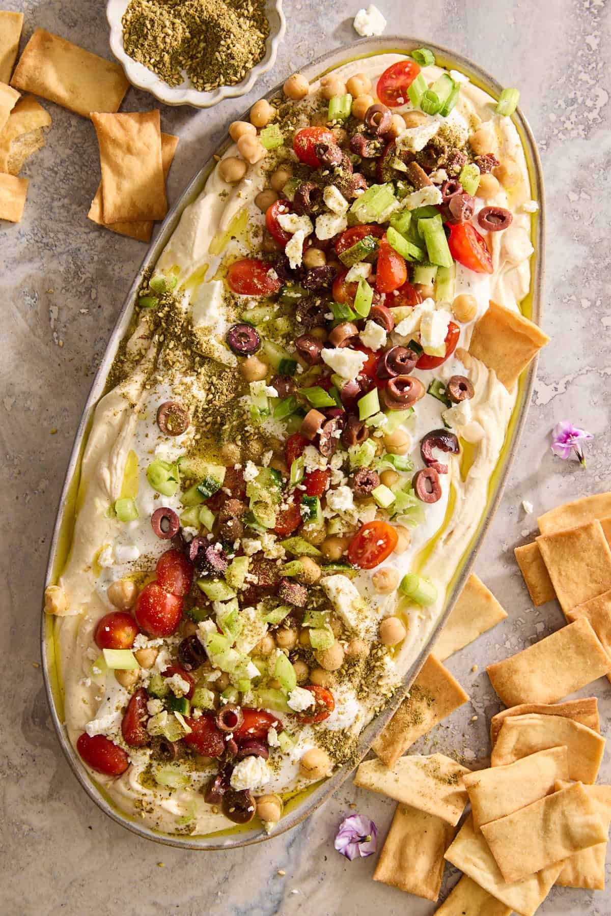 7 Layer Greek Dip with Tzatziki at the Table