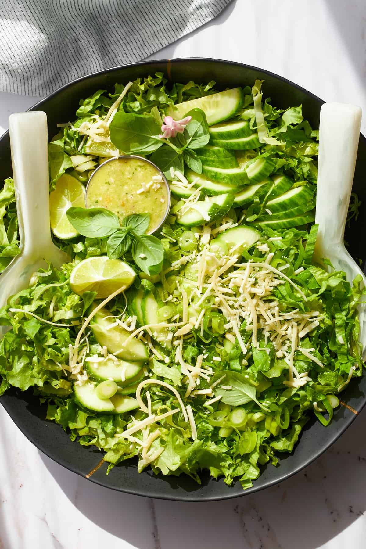 A bowl of green goddess salad.