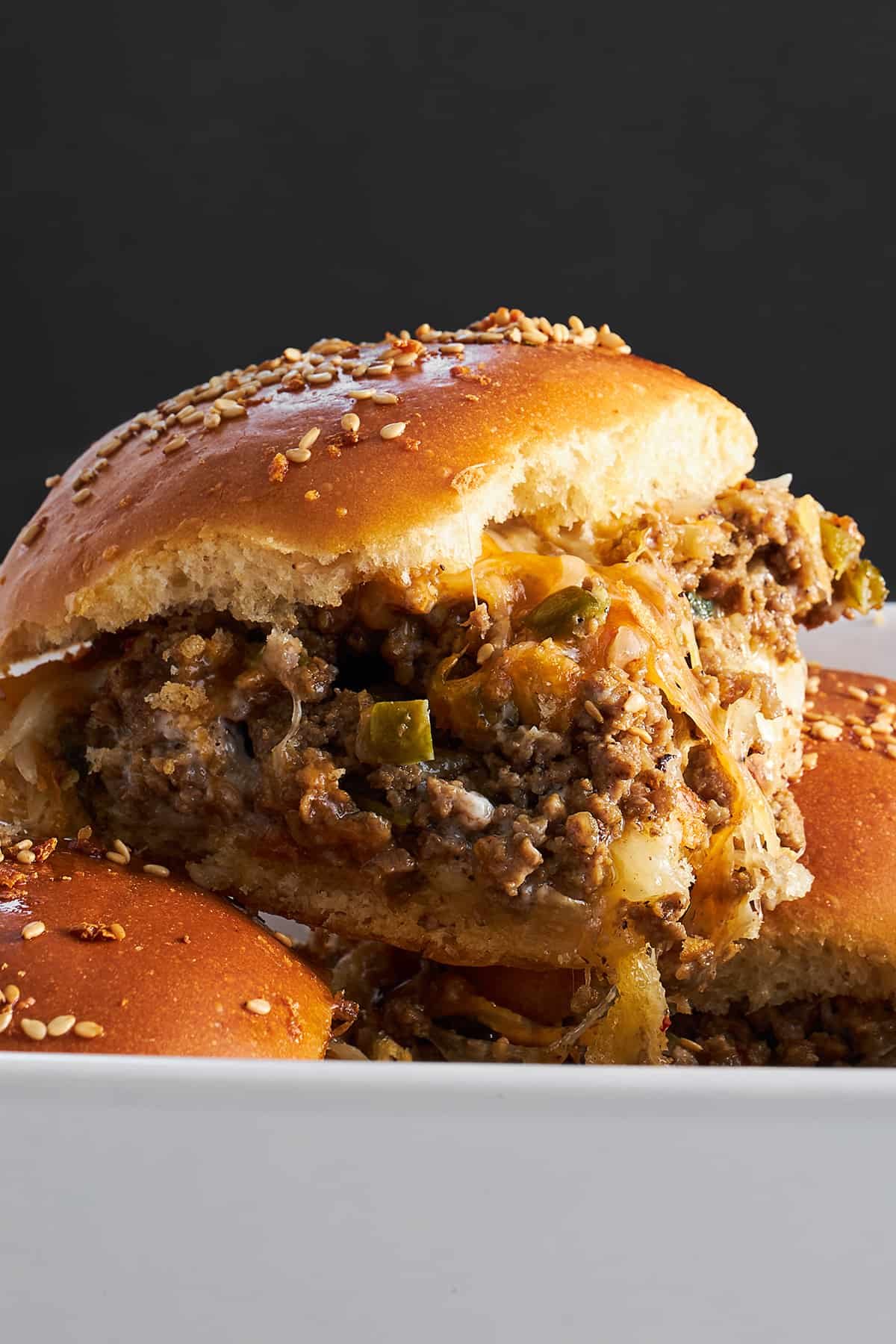 Side view of a cheeseburger slider.