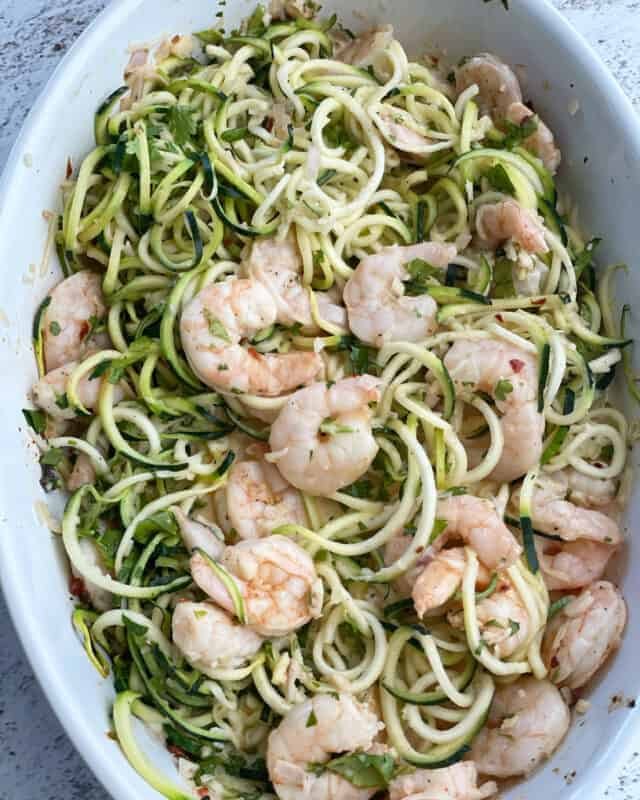 healthy shrimp scampi with zucchini noodles in a baking dish