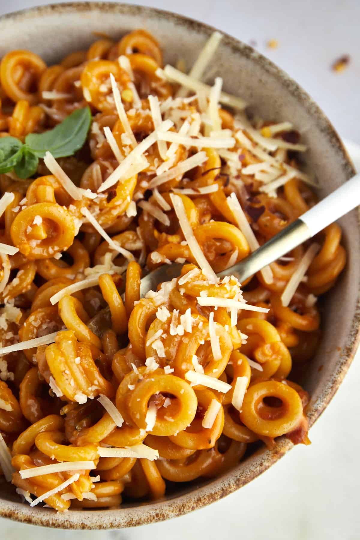 close up image of a spoonful of homemade spaghetti o's