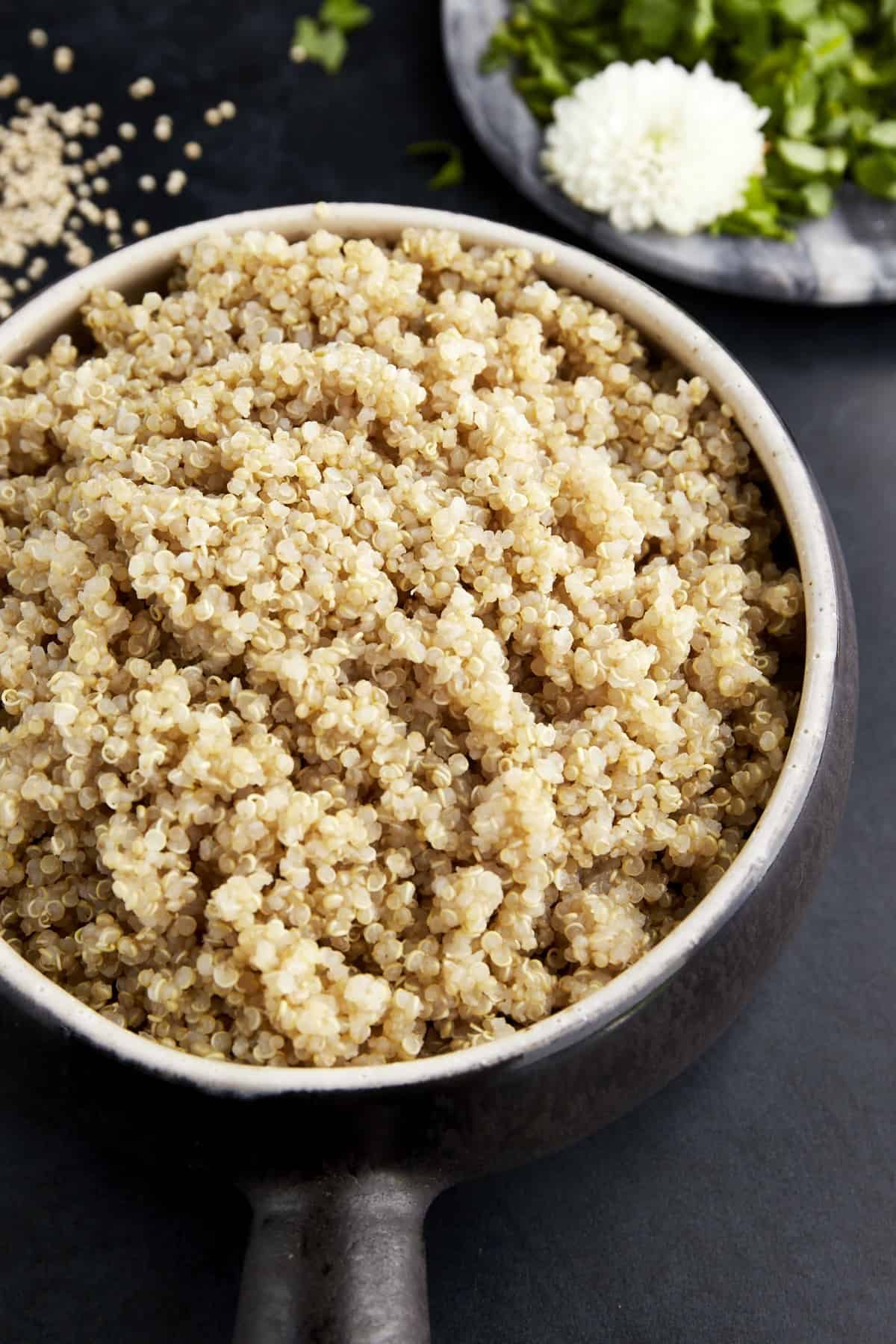 A pot of cooked quinoa.