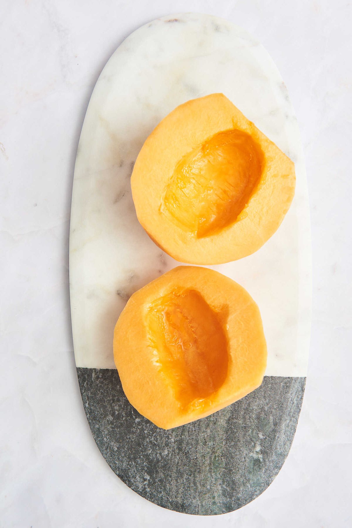 Overhead image of two halves of a melon.