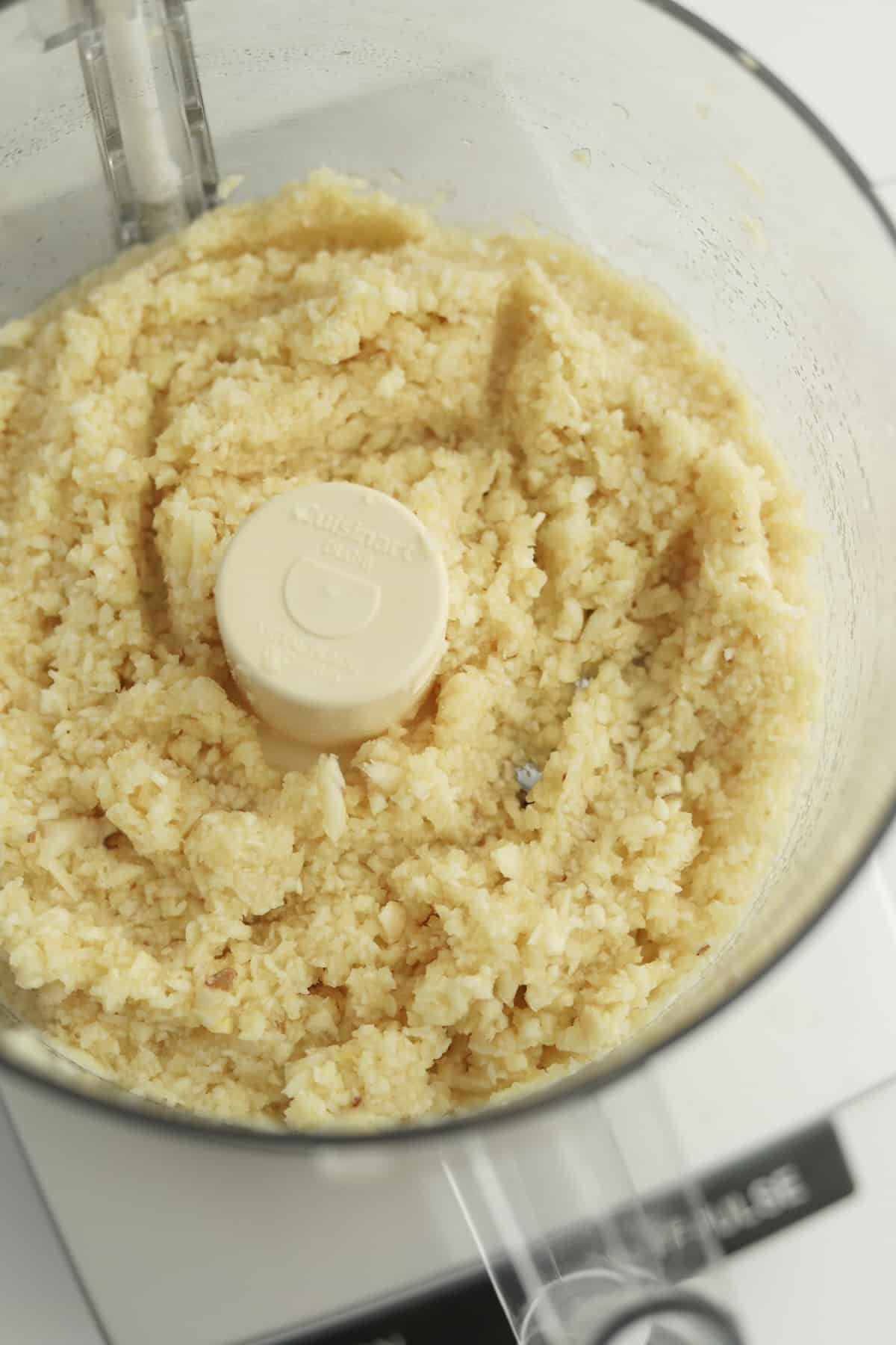 minced garlic cloves in a food processor.