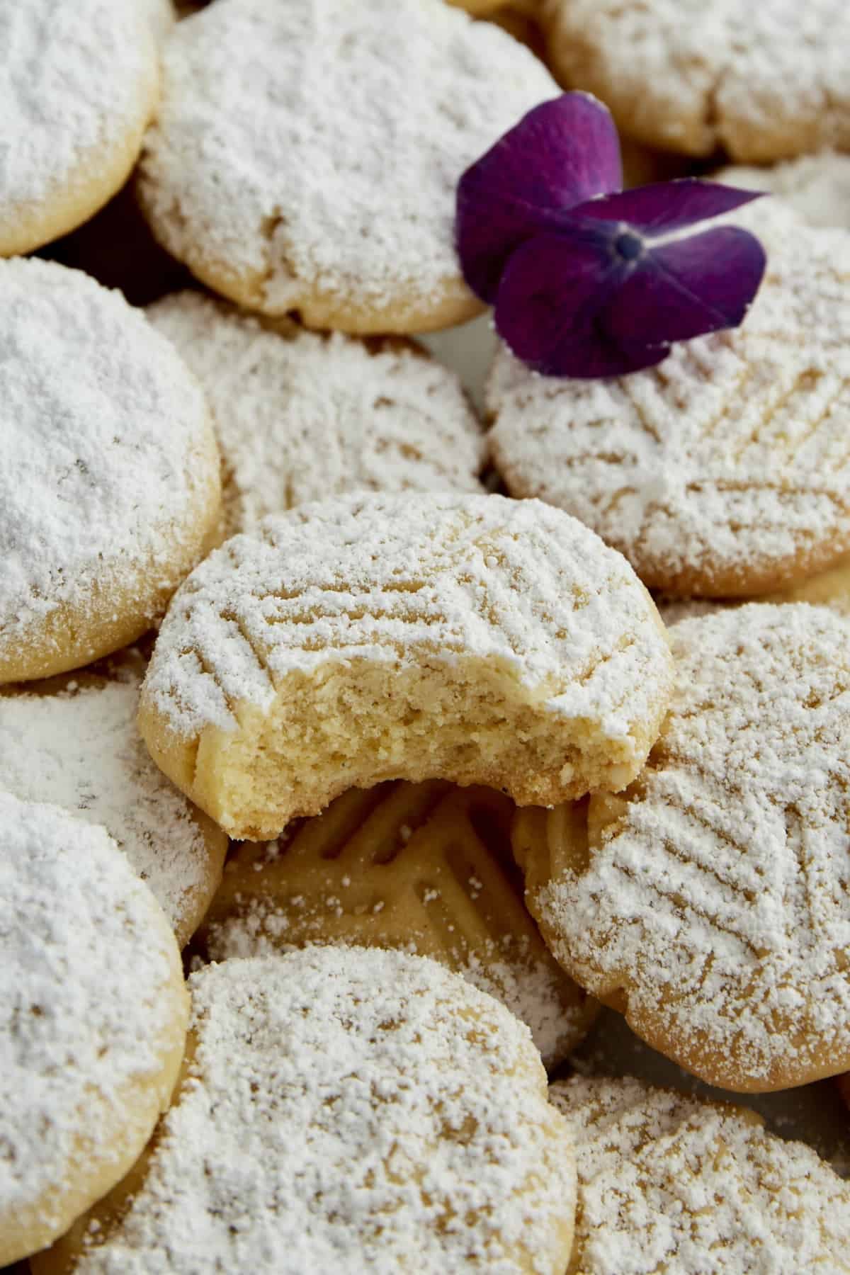 A close up image of a Kahk Cookie with a bite taken out.