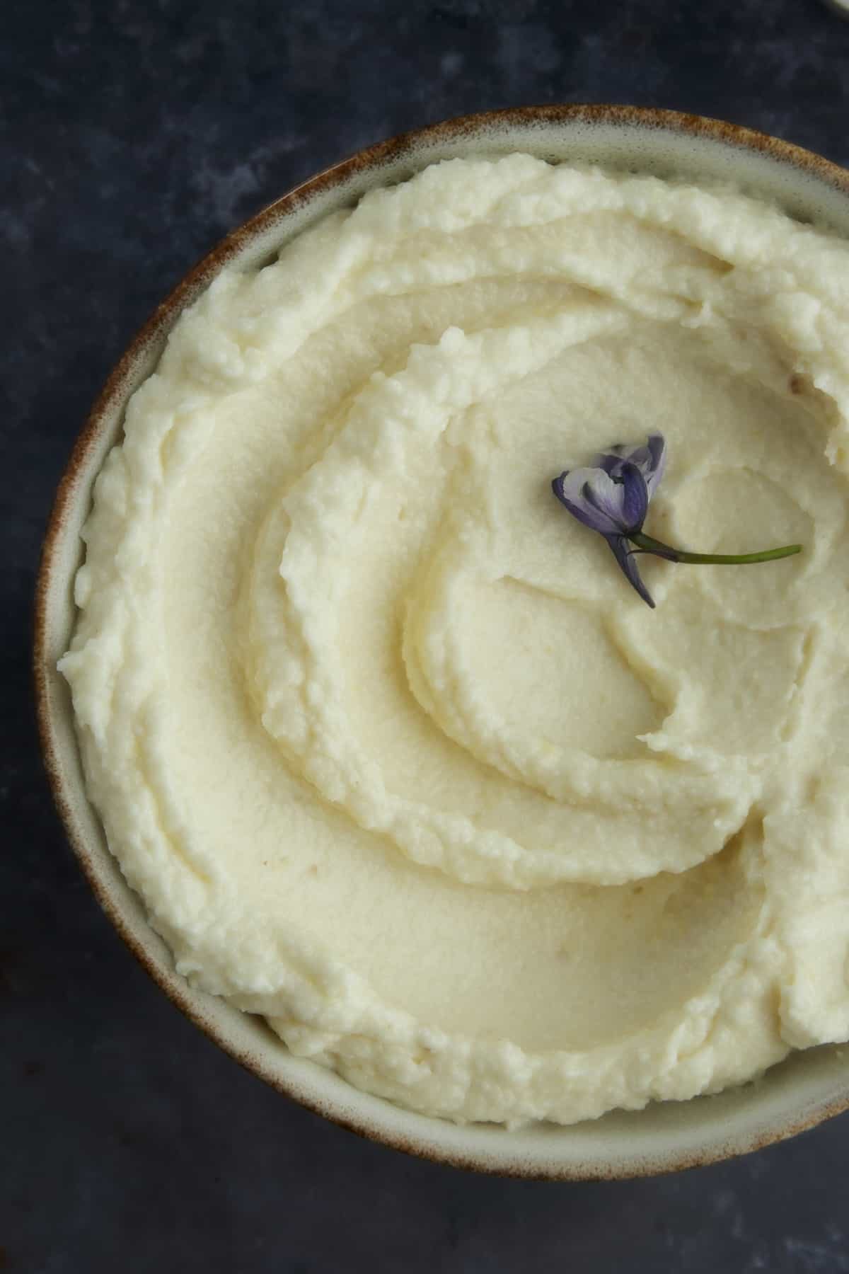 overhead image of Lebanese garlic sauce in a bowl