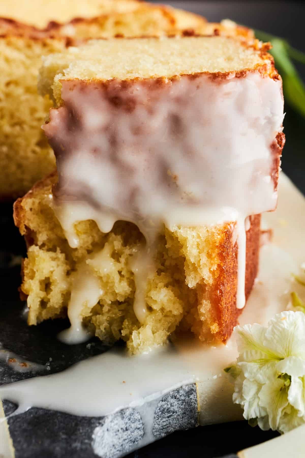Pieces of an iced lemon loaf.